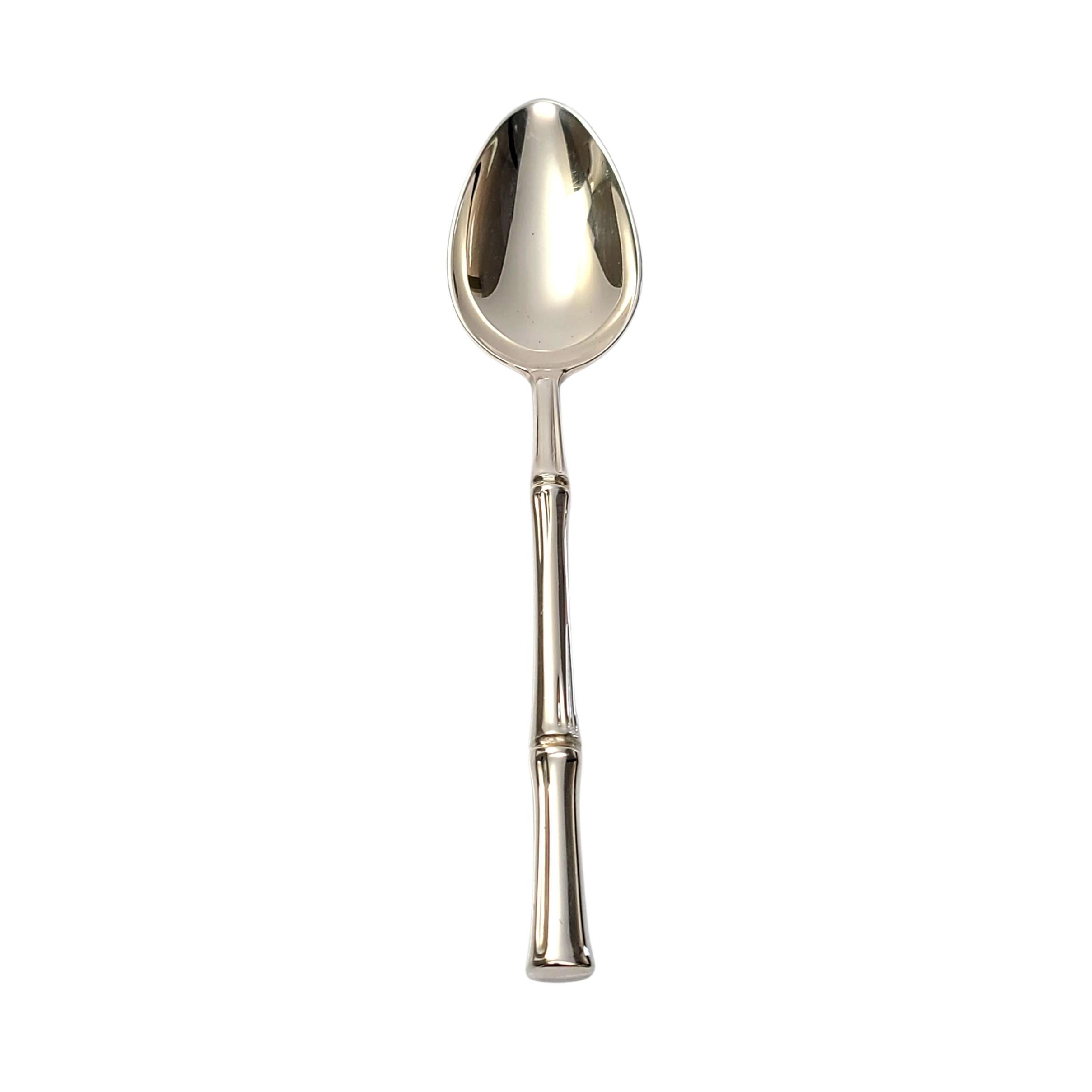 Sterling silver dessert/oval soup spoon by Tiffany & Co in the Bamboo pattern.

No monogram

Introduced in 1961, the mid-century design of the Bamboo pattern is still in demand today. This spoon is a beautiful, heavy and substantial piece. Tiffany &
