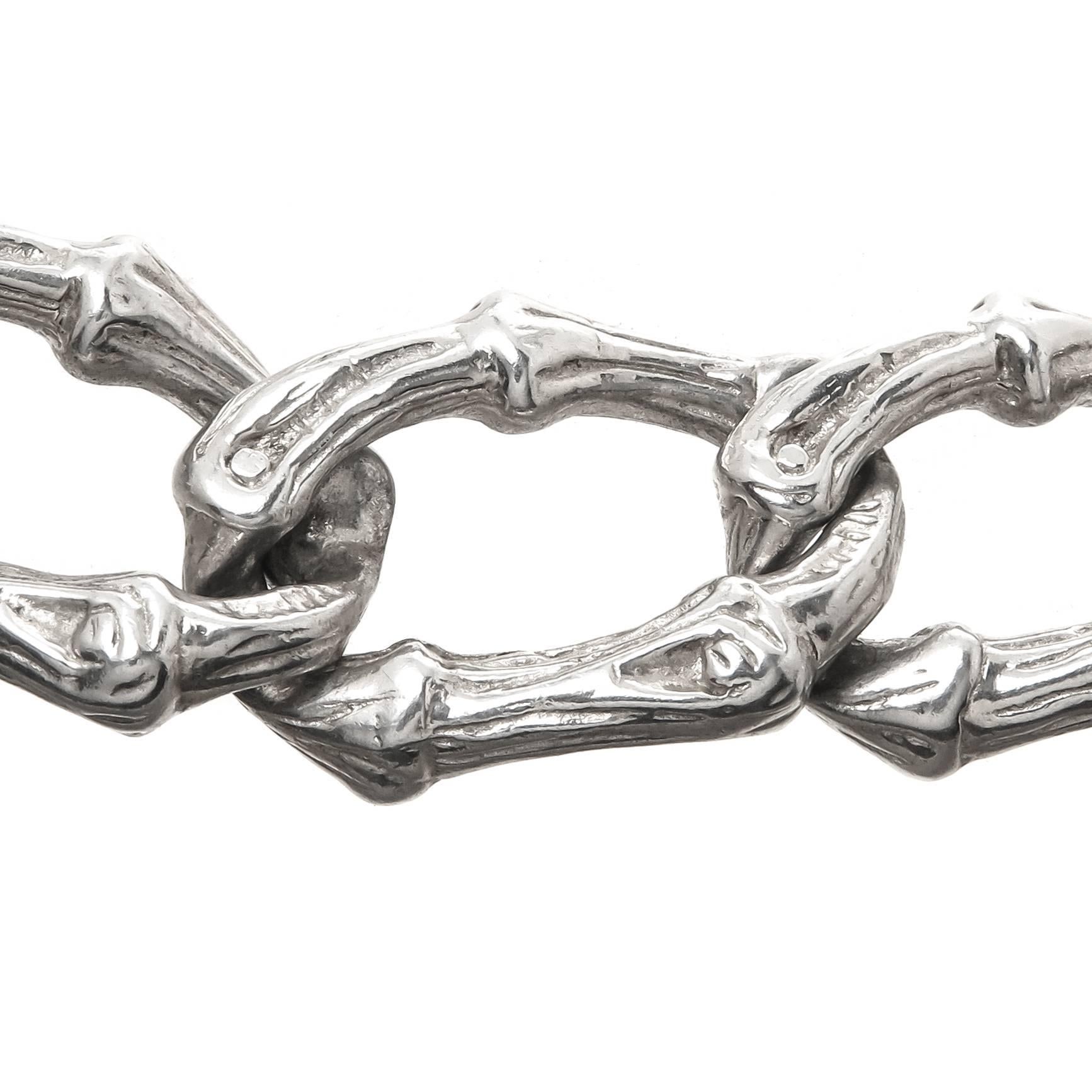 Circa 1990s Tiffany & Company Sterling Silver Bamboo Link Bracelet, having Solid links and measuring 7 3/4 inch in length and 5/8 inch wide, having a Toggle clasp.