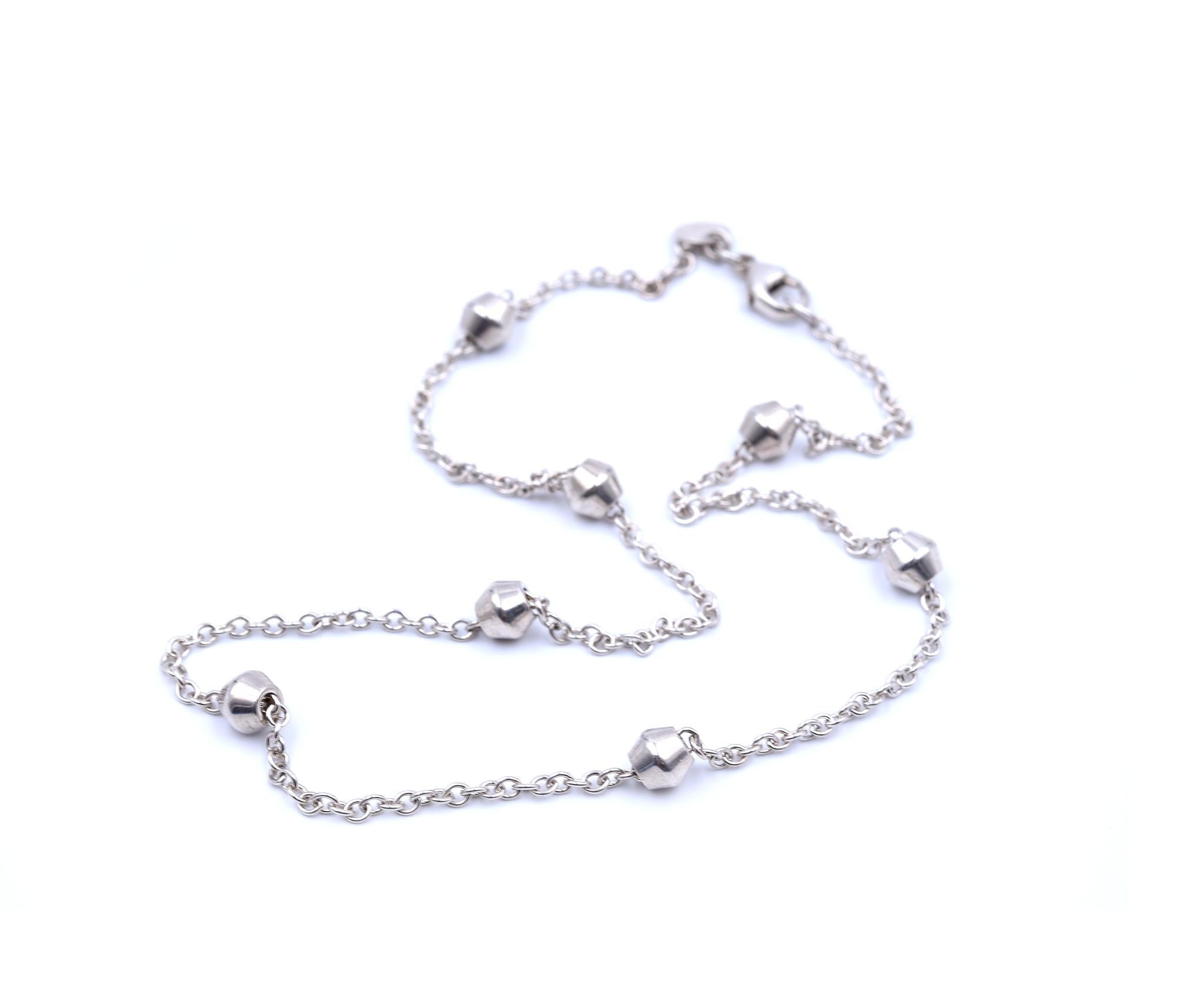 Designer: Tiffany & Co
Hallmarks: T & CO
Material: Sterling Silver
Dimensions: necklace is 16-inches long, each barrel bead is approximately 6.24mm wide
Weight: 11.26 grams
