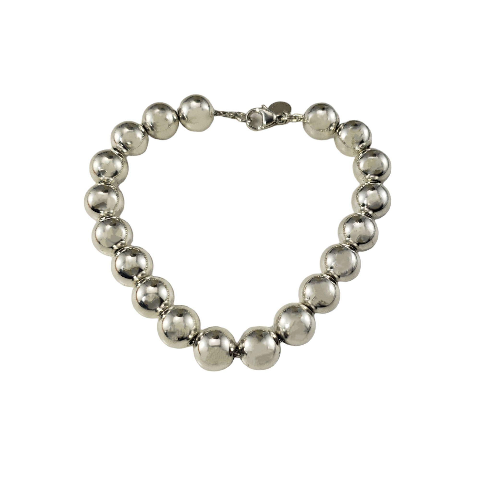 Tiffany & Co. Sterling Silver Beaded Bracelet-

This lovely beaded bracelet by Tiffany & Co. is crafted in classic sterling silver. Width: 10 mm.

Size: 7.25 inches

Weight: 20.5 gr./ 13.2 dwt.

Hallmark: Tiffany & Co. 925

Very good condition,