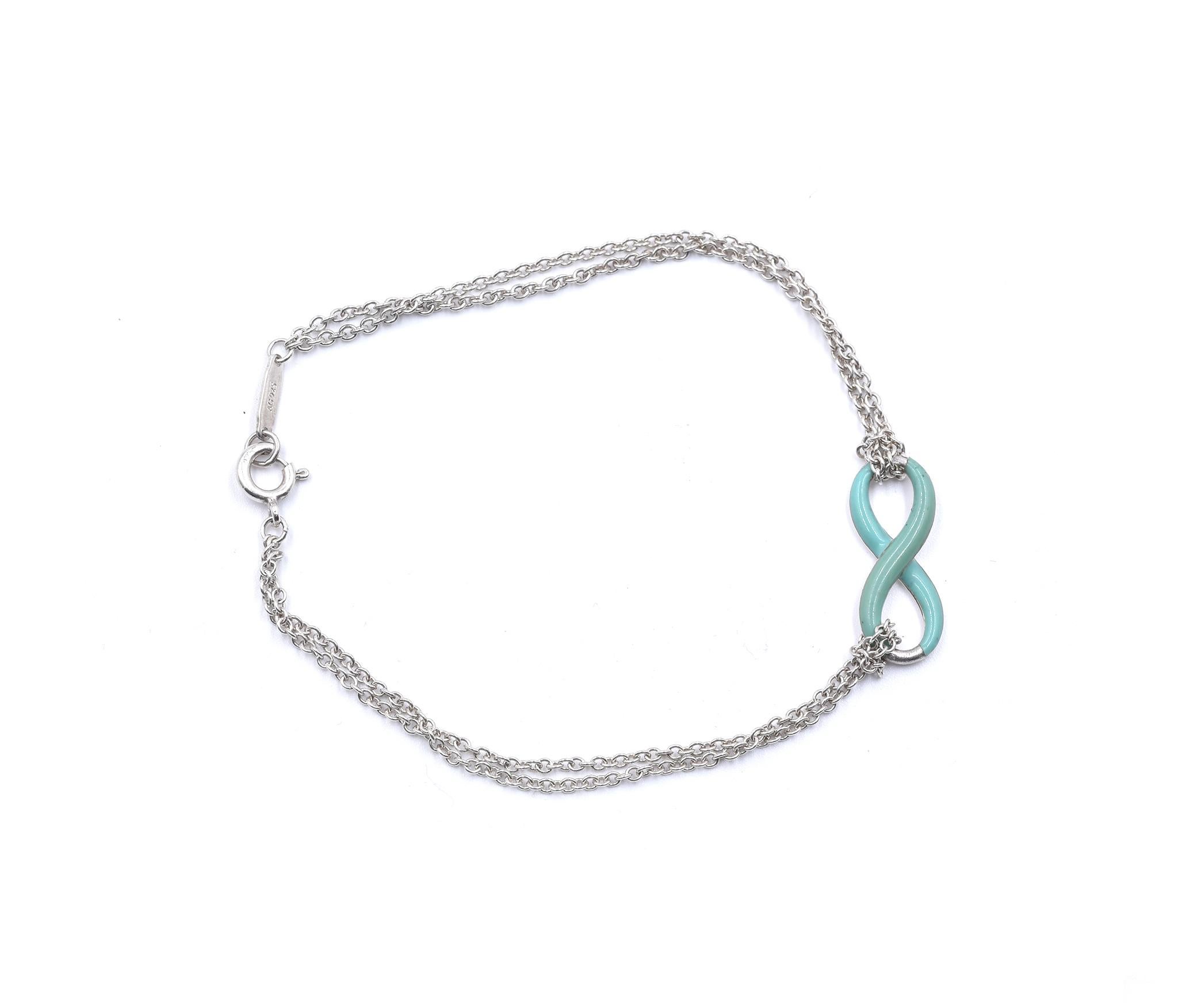 Designer: Tiffany & Co. 
Material: sterling silver
Dimensions: band measures 7.25-inches
Weight: 2.57 grams
