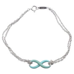 Tiffany and Co. Sterling Silver Blue Enamel Infinity Bracelet For Sale at  1stDibs | tiffany infinity bracelet, infinity tiffany bracelet, tiffany's  infinity bracelet