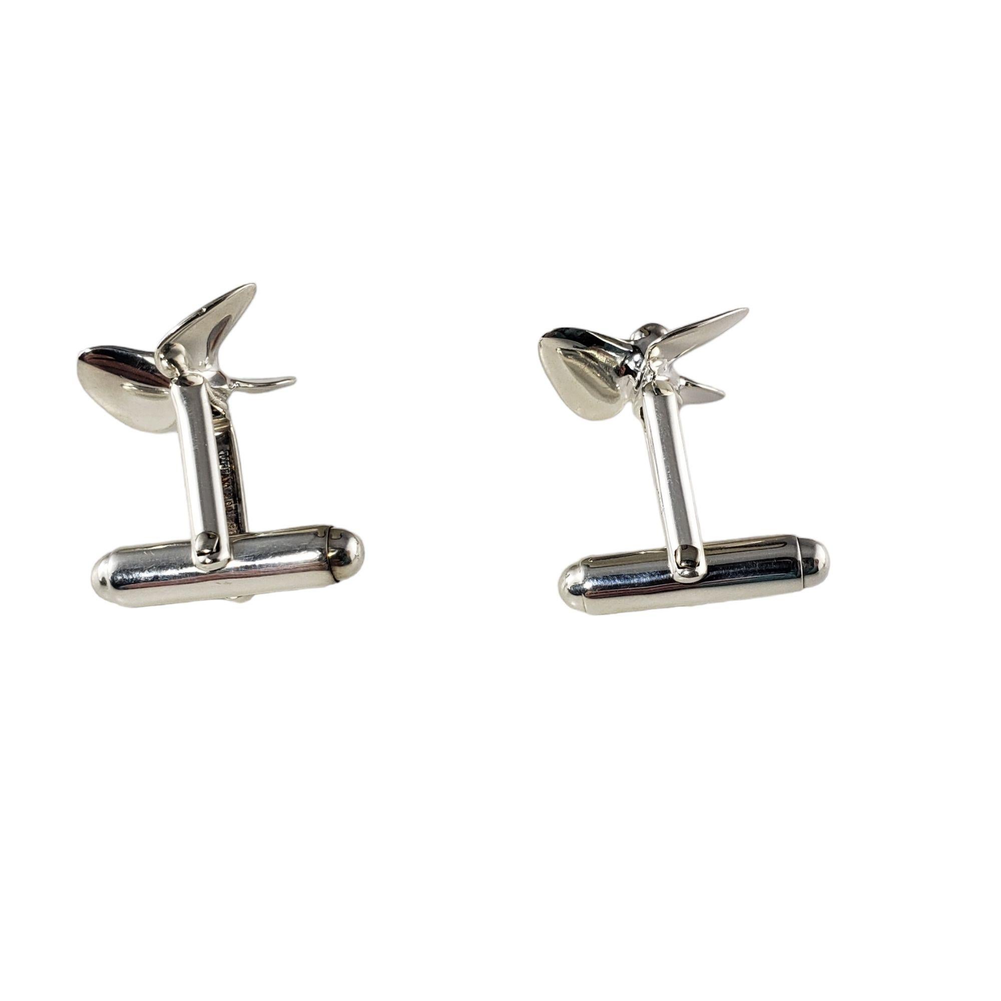 Vintage Tiffany & Co. Sterling Silver Boat Propeller Cufflinks-

These elegant boat propeller cufflinks by Tiffany and Co. are crafted in meticulously detailed sterling silver.

Size: 15 mm

Weight: 6.2 gr./ 3.9 dwt.

Hallmark: TIFFANY & CO.
