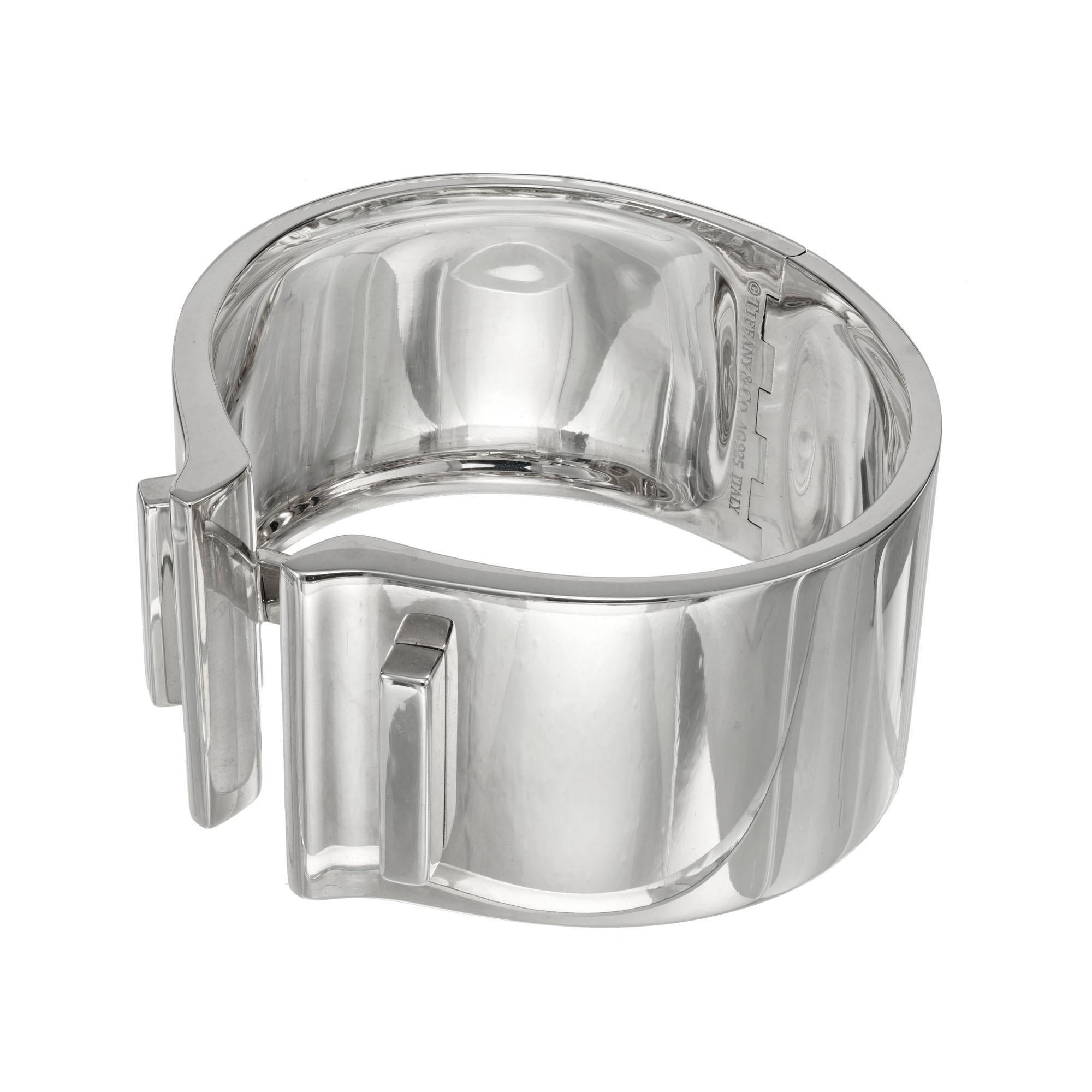 Tiffany & Co Sterling Silver bone cuff bangle bracelet. Tiffany box and pouch included. Fits a 7 Inch wrist 

Sterling Silver
Stamped: AG925
Hallmark: Tiffany & Co 
135.5 grams
Width: 34.55mm
Thickness/depth: 2.7mm - 15.0mm
Inside dimensions: 2.5