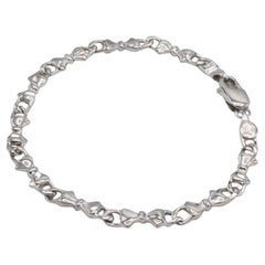 Tiffany & Co. Bracelet à maillons en argent sterling avec nœud 