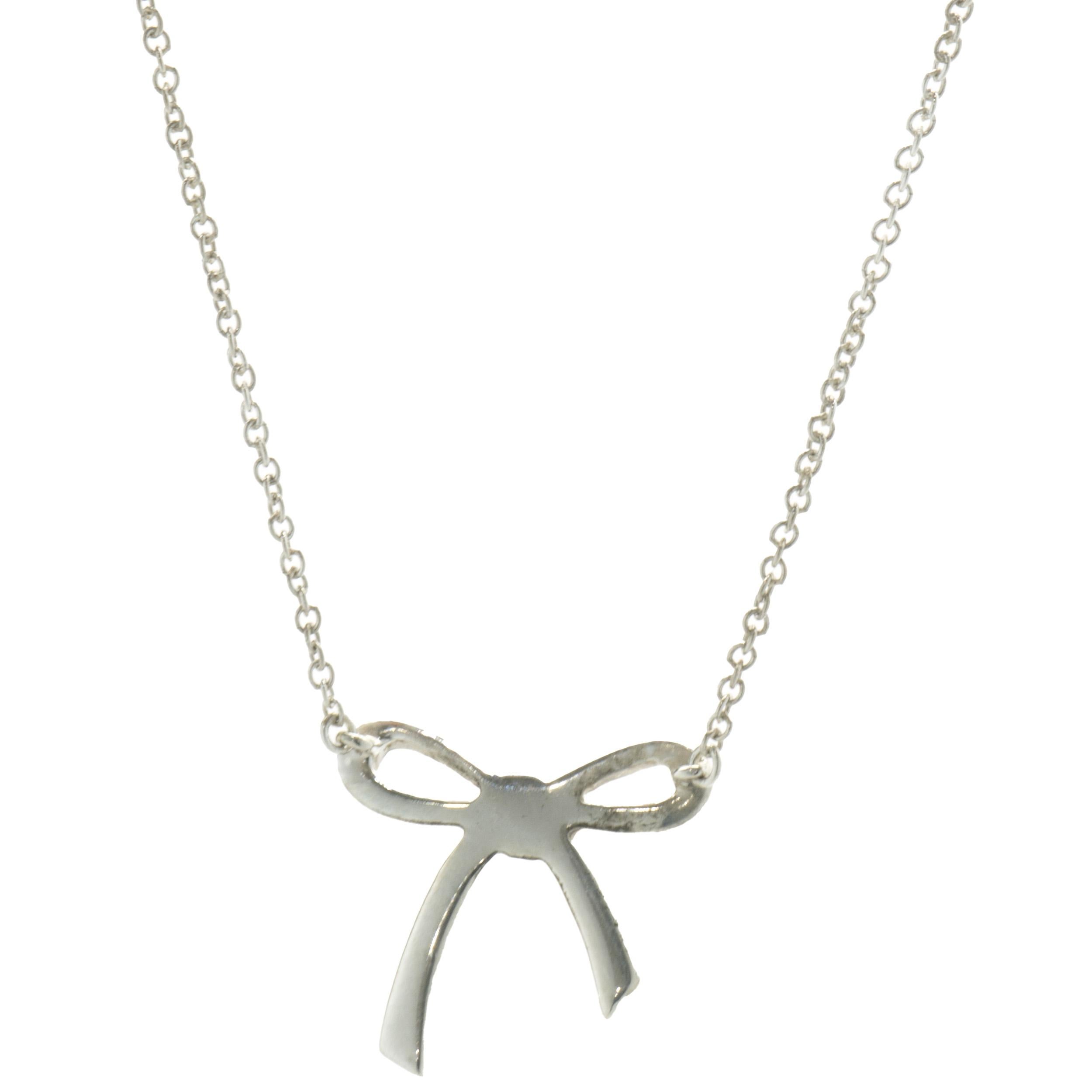 Designer: Tiffany & Co. 
Material: sterling silver
Dimensions: necklace measures 15-inches
Weight: 1.87 grams