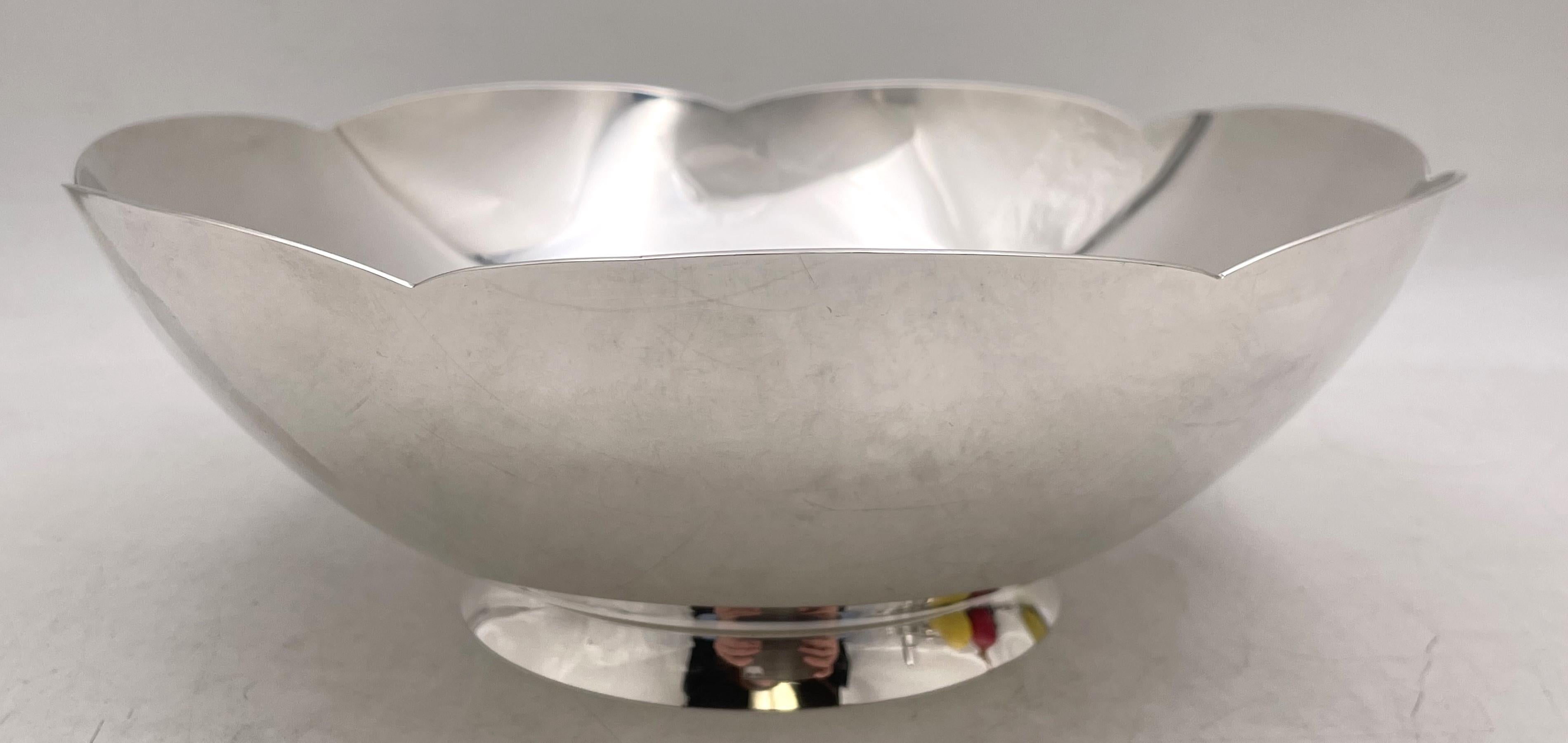 Tiffany & Co. sterling silver multi-lobed bowl, in Mid-Century Modern style, with an elegant, geometric design, and in pattern number 23843. It measures 8 7/8'' in diameter by 3 1/8'' in height, weighs 19.6 troy ounces, and bears hallmarks as shown.