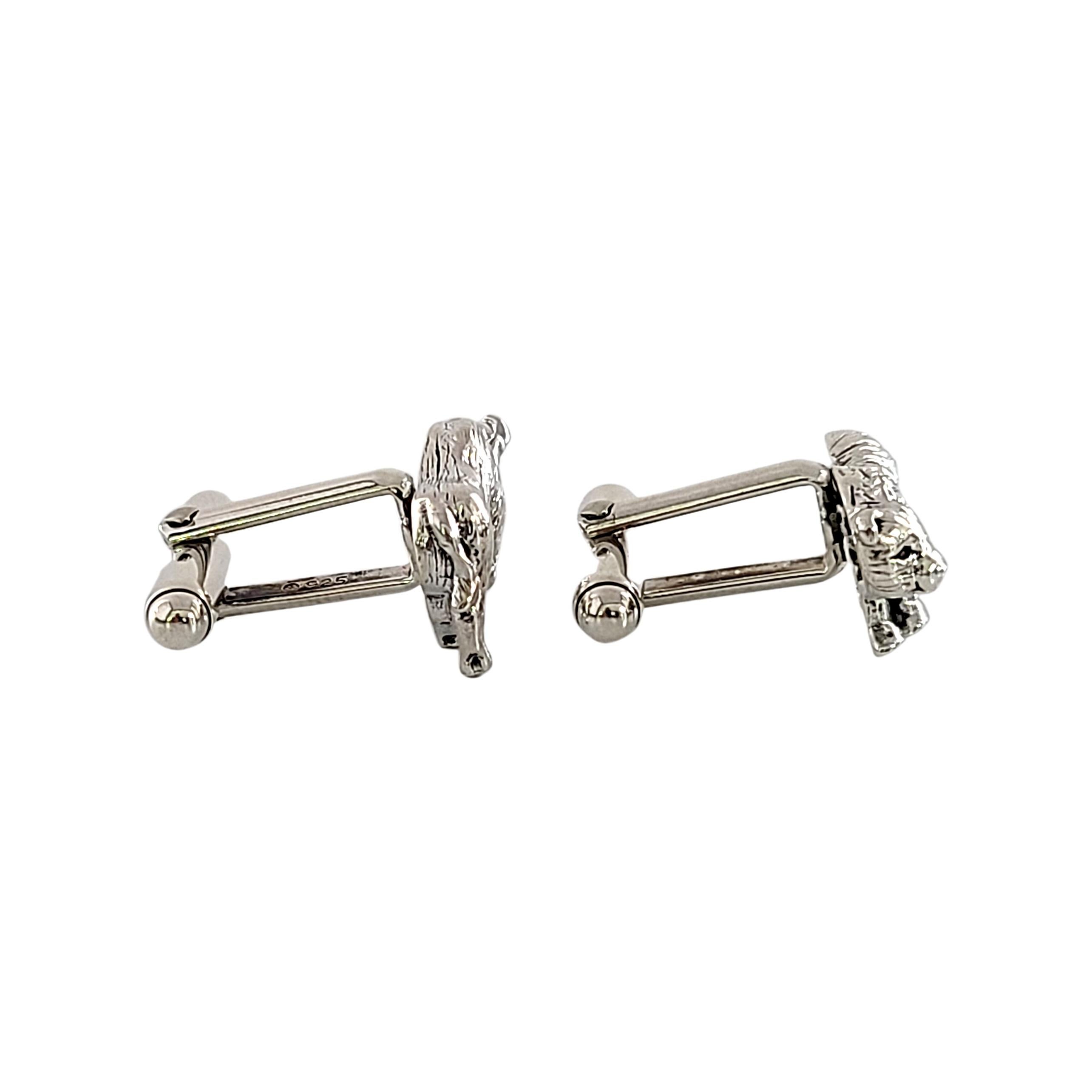 Tiffany & Co sterling silver bull and bear cufflinks.

Authentic Tiffany cufflinks featuring the classic stock market icons, a bull and a bear. Tiffany box and pouch not included.

Measures approx 3/4