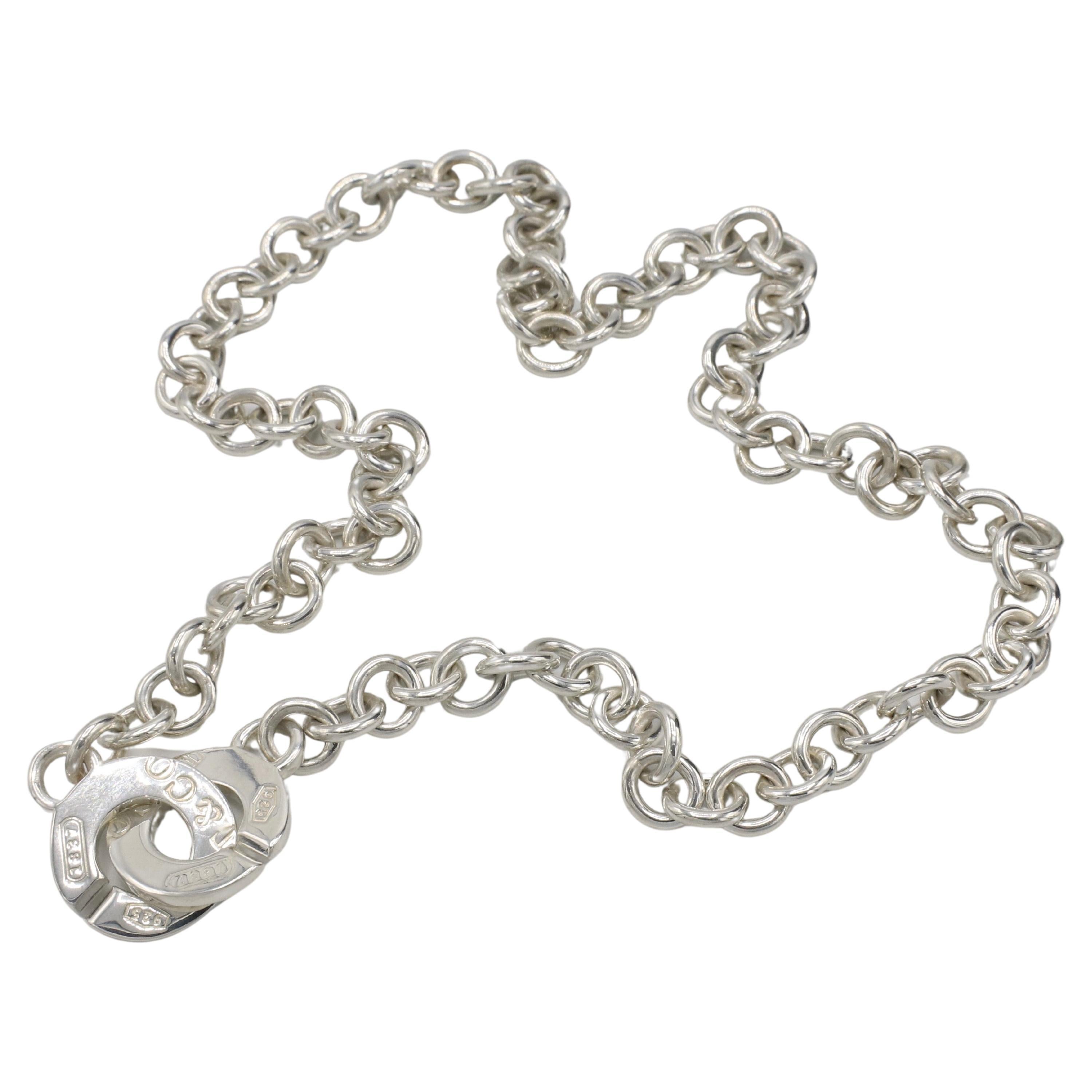 Tiffany & Co. Sterling Silver Chain Link 1837 Circle Clasp Necklace 
Metal: Sterling silver 925
Weight: 47 grams
Links: 7.5 x 8.5mm
Length: 17 inches
