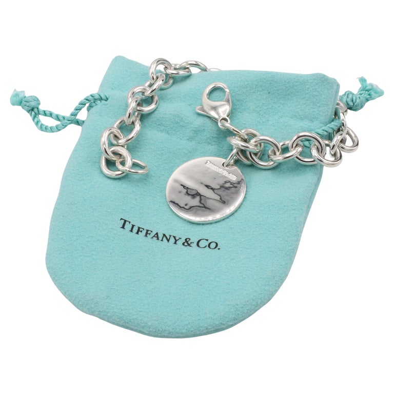 Tiffany and Co. Bracelet en argent sterling avec breloques en forme de  cercle et maillons de chaîne En vente sur 1stDibs