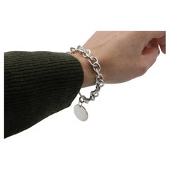 Tiffany & Co. Pulsera de plata de ley con cadena de eslabones y charm circular