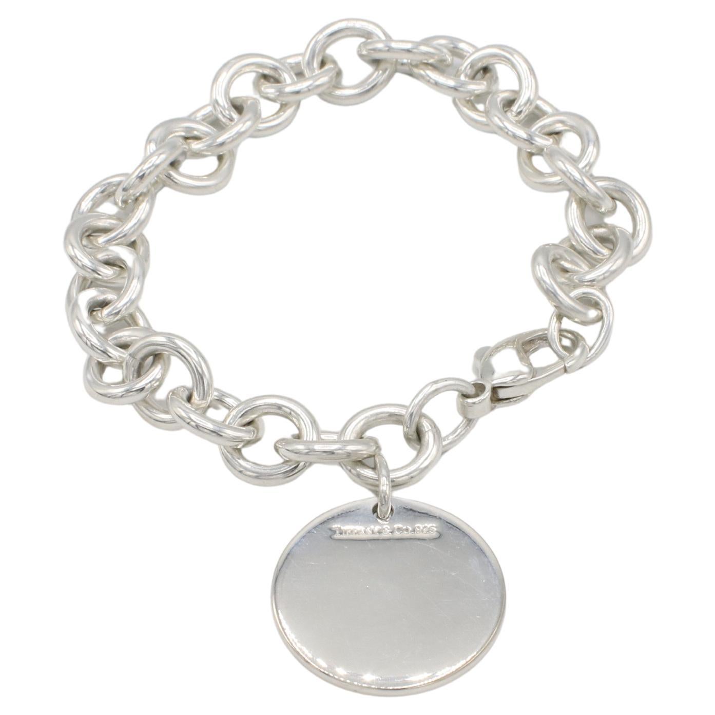 Tiffany
Co. Sterling Silver Circle Tag Charm Chain Link Bracelet