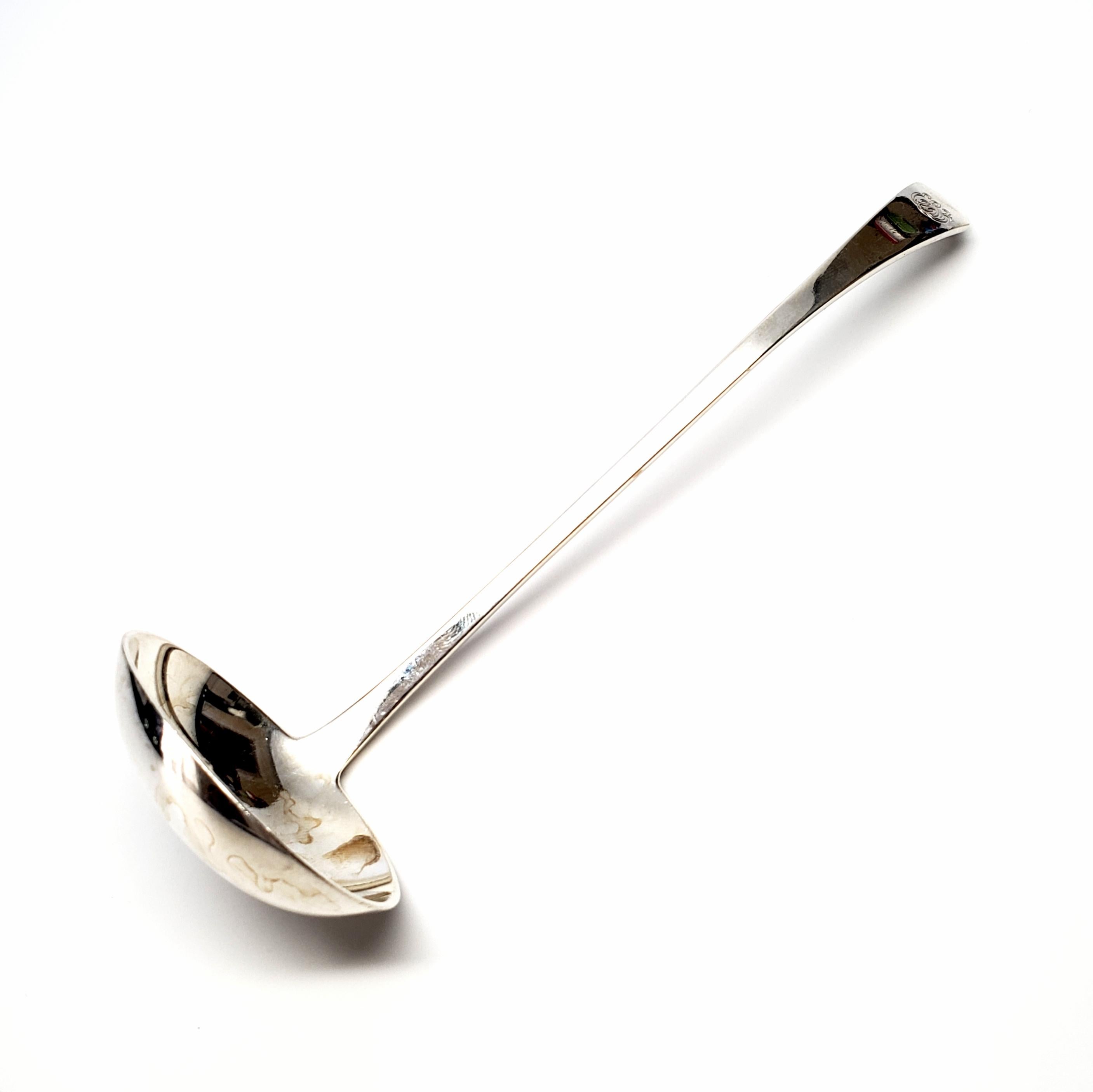 Antique sterling silver gravy ladle by Tiffany & Co. in the Clinton pattern.

Monogram appears to be EBF

Beautiful ladle with a small oval bowl. The Clinton pattern was in production from 1912-1955. The pattern's clean and timeless design makes