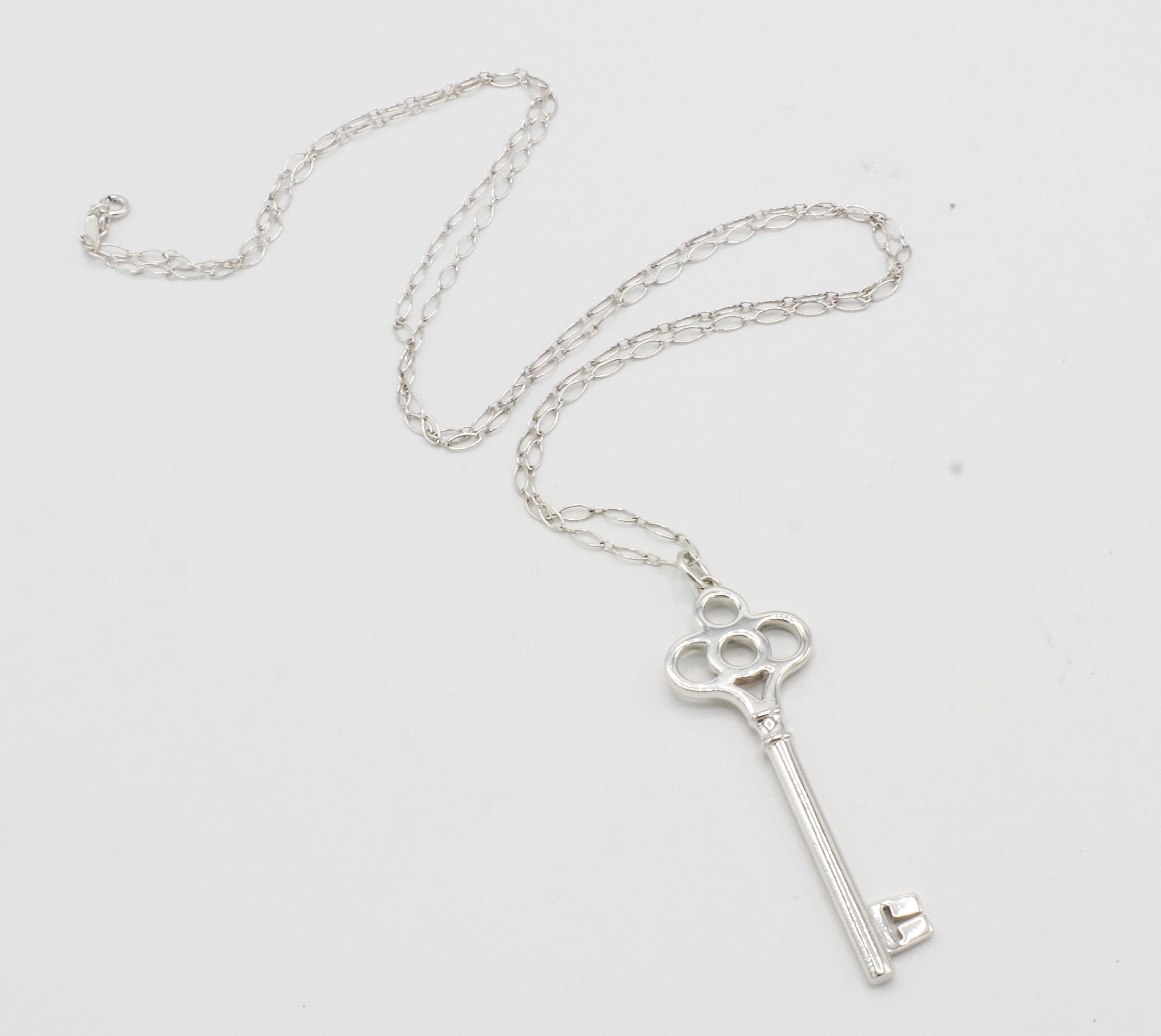 Modern Tiffany & Co. Sterling Silver Crown Key Pendant Long Chain Necklace