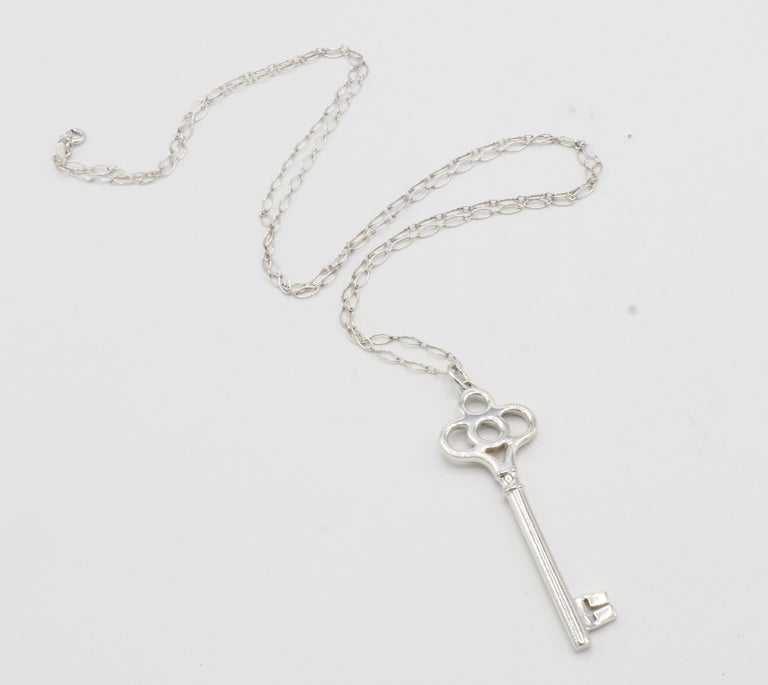 Tiffany and Co. Sterling Silver Crown Key Pendant Long Chain Necklace