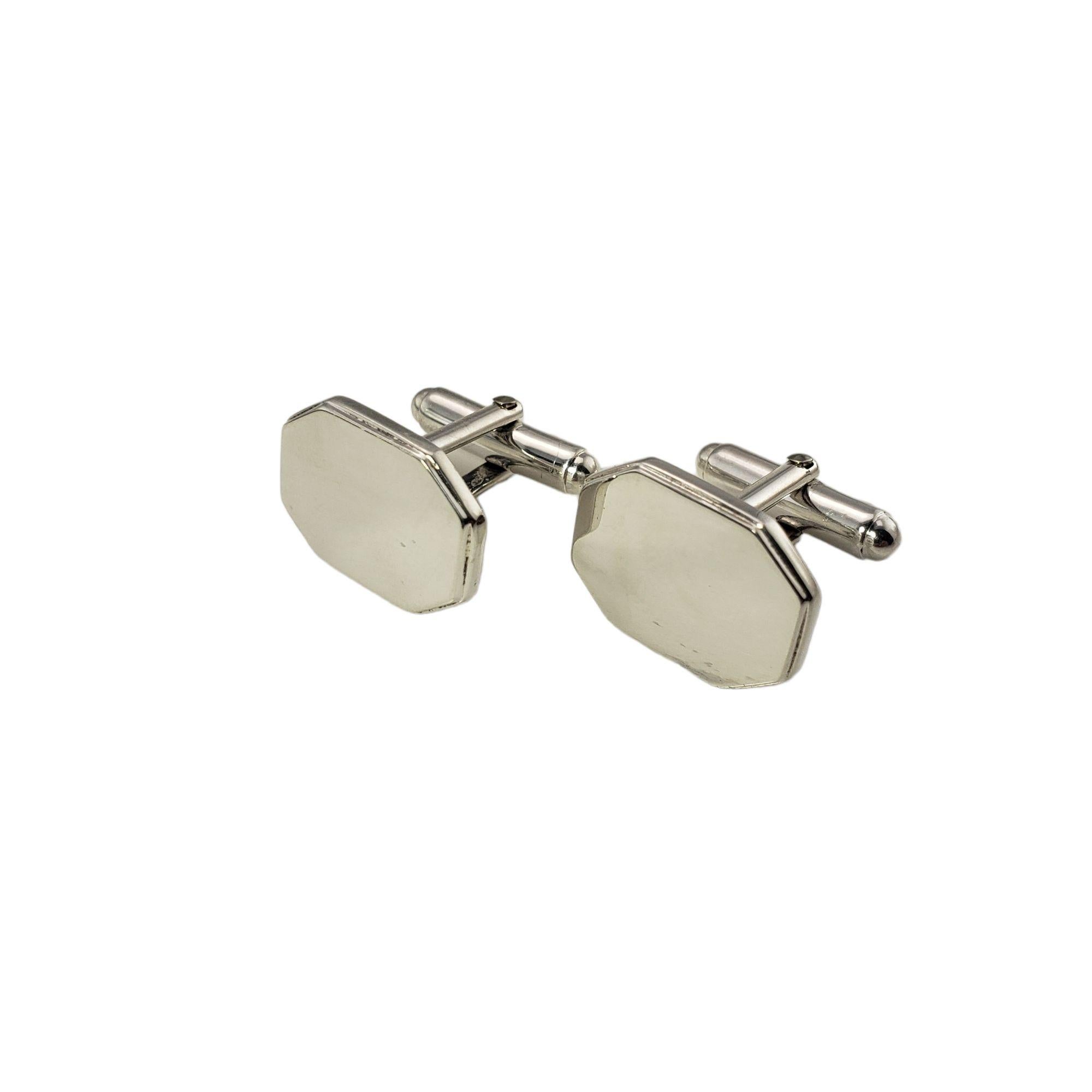 These elegant cufflinks by Tiffany & Co. are crafted in meticulously detailed sterling silver.

Size: 19 mm x 14 mm

Weight:  8.6 dwt. / 13.5 gr.

Stamped:  Tiffany & Co. 925

Very good condition, professionally polished.

Will come packaged in a