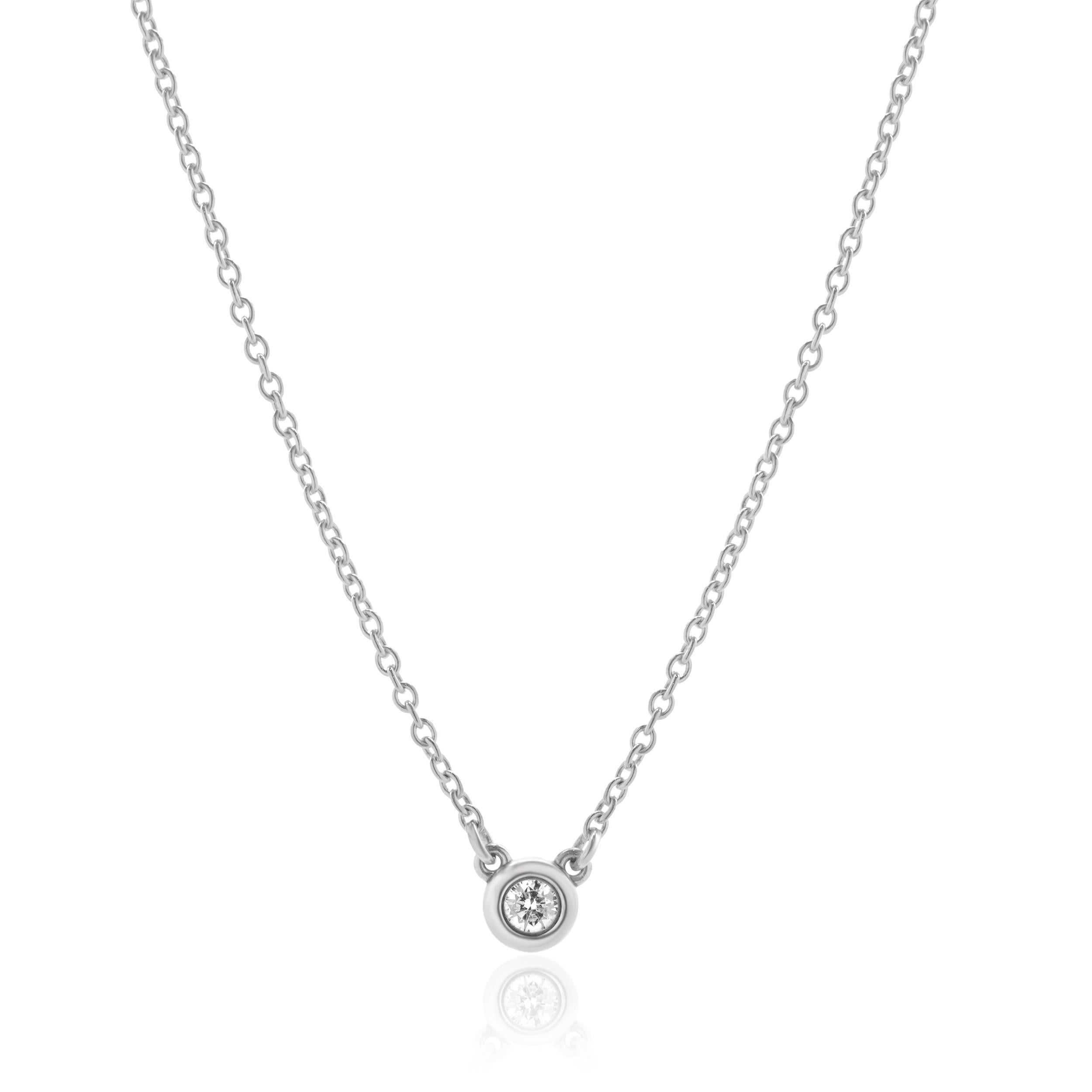 Designer: Tiffany & Co. 
Material: sterling silver
Diamond: 1 round brilliant cut = 0.07ct
Color: G
Clarity: SI1
Dimensions: necklace measures 16.5-inches in length
Weight: 1.59 grams
