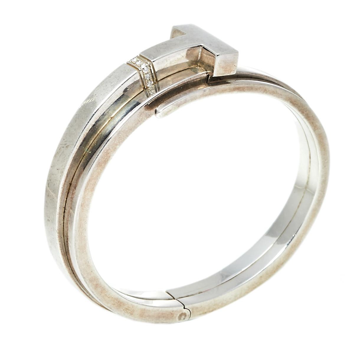 The Tiffany T collection by Tiffany & Co. is inspired by the city of New York. Each piece comes with a distinct shape that boasts fabulous style and structure. This cuff bracelet is sculpted from silver and styled into a band that has the letter T.