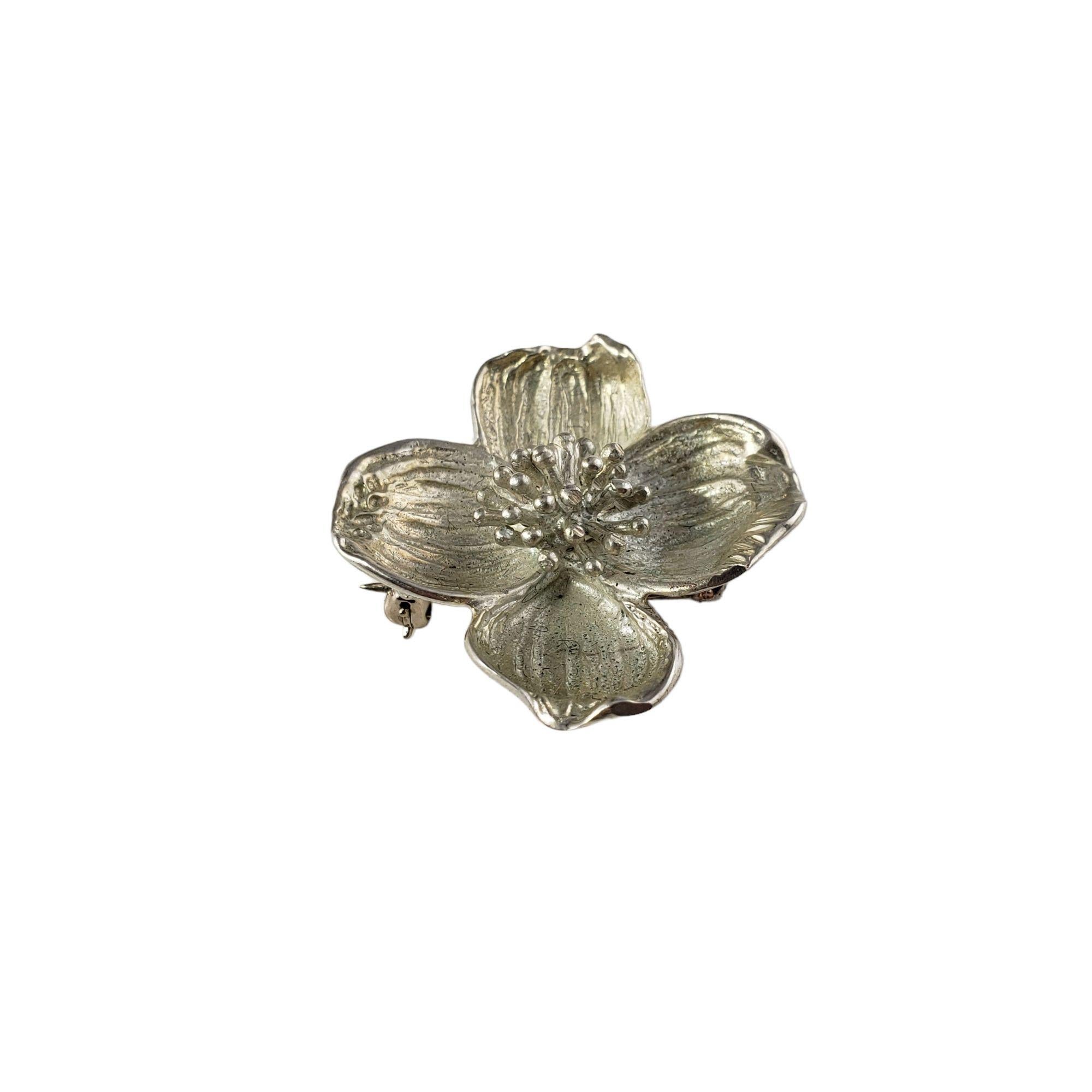 Vintage Tiffany and Co. Sterling Silver Dogwood Blossom Brooch/Pin-

This lovely dogwood blossom brooch is crafted in beautifully detailed sterling silver by Tiffany & Co.

Matching earrings: RL-00013776
Matching bracelet: RL-00013782

Size: 34 mm x