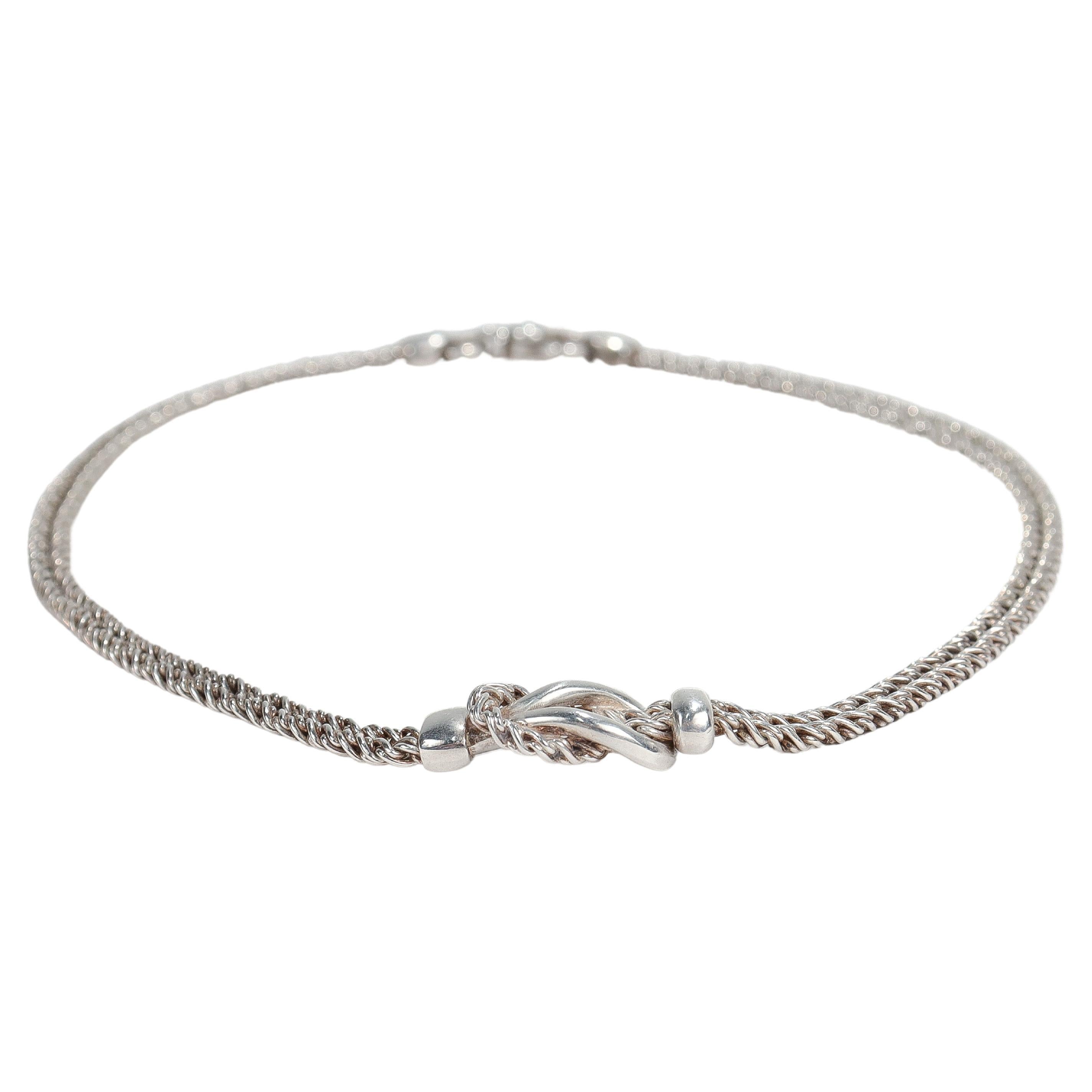 A fine love knot rope chain necklace.

By Tiffany & Co.

In sterling silver.

Comprised of two woven rope chains joined in a double loop love knot at the center of the necklace.

Simply wonderful Tiffany design!

Date:
20th Century

Overall