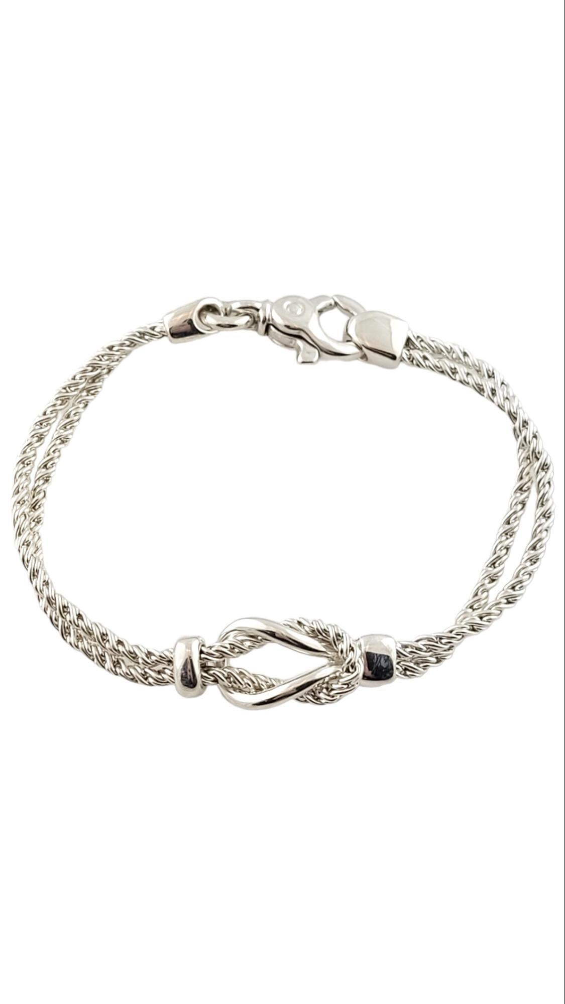 Vintage Tiffany & Co Sterling Silver Double Rope Love Knot Bracelet w/ Tiffany Box

This gorgeous Tiffany & Co double rope bracelet was crafted from sterling silver with a beautiful love knot!

Size: 6.75