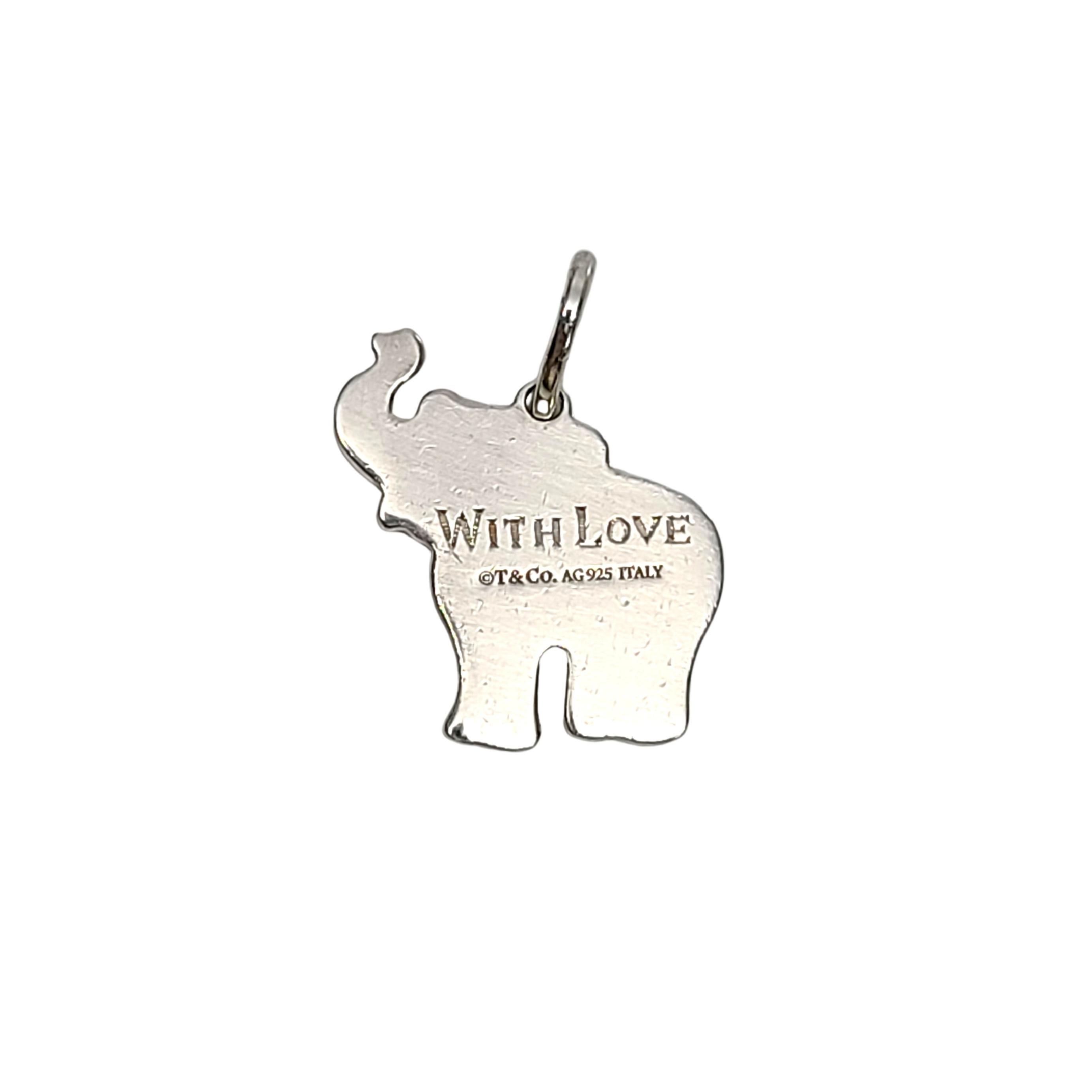 Tiffany & Co sterling silver elephant pendant/charm.

Engraved: 