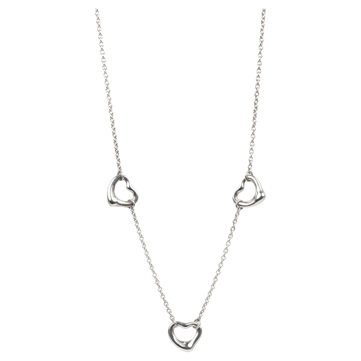 Tiffany
Co. Collier en argent Elsa Peretti à 3 cœurs ouverts