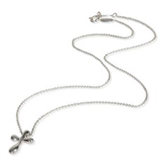 Tiffany & Co. Argenterie sterling Pendentif croix Elsa Peretti