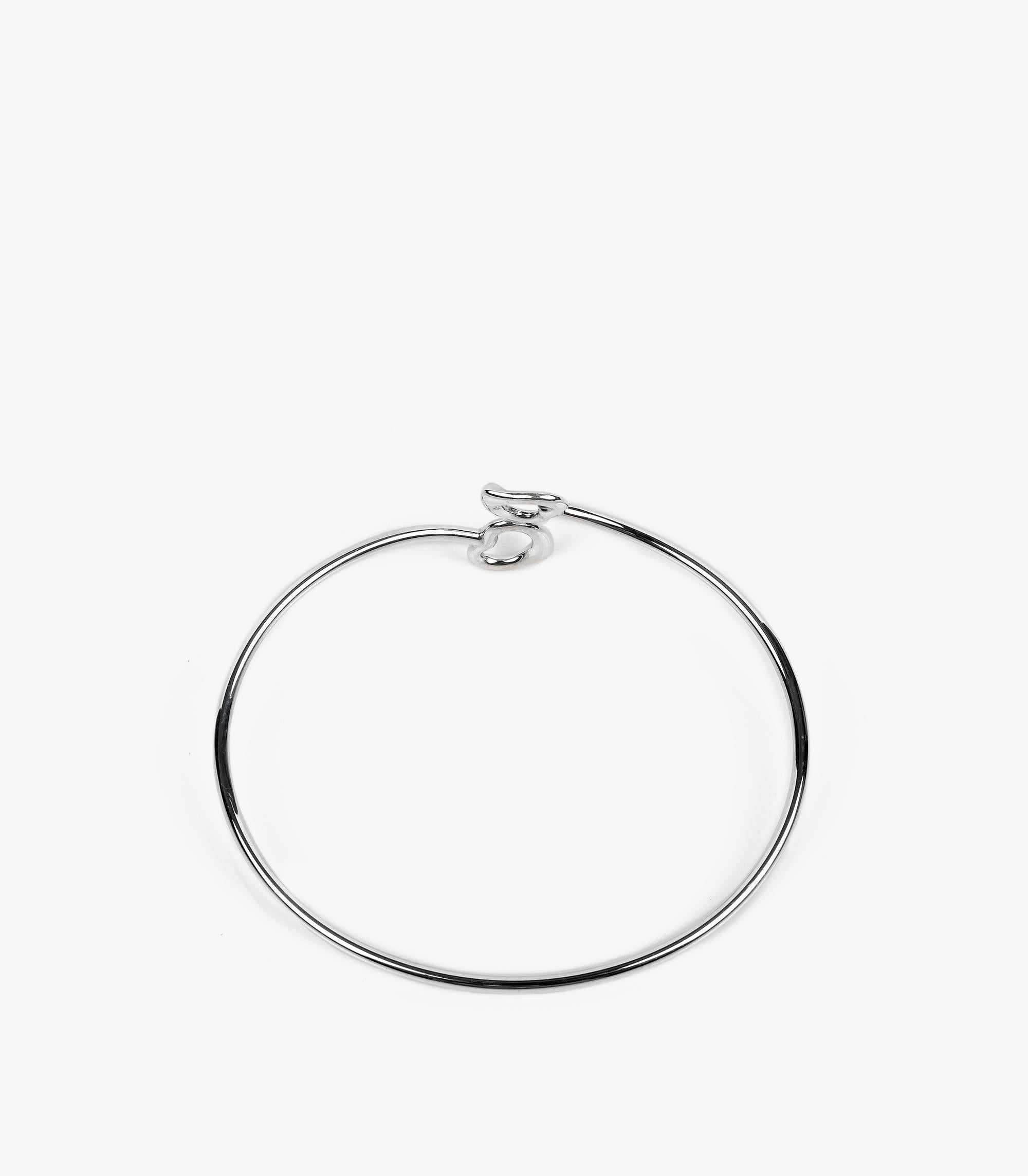 Tiffany & Co. Sterling Silver Elsa Peretti Open Heart Bangle

Product Details
Xupes Ref: J1527
Brand: Tiffany & Co.
Model: Open Heart Bangle
Type: Bracelet
Material(s): Sterling Silver

Specification
Total Weight: 7.3g
Bracelet Length: 17cm
Bracelet