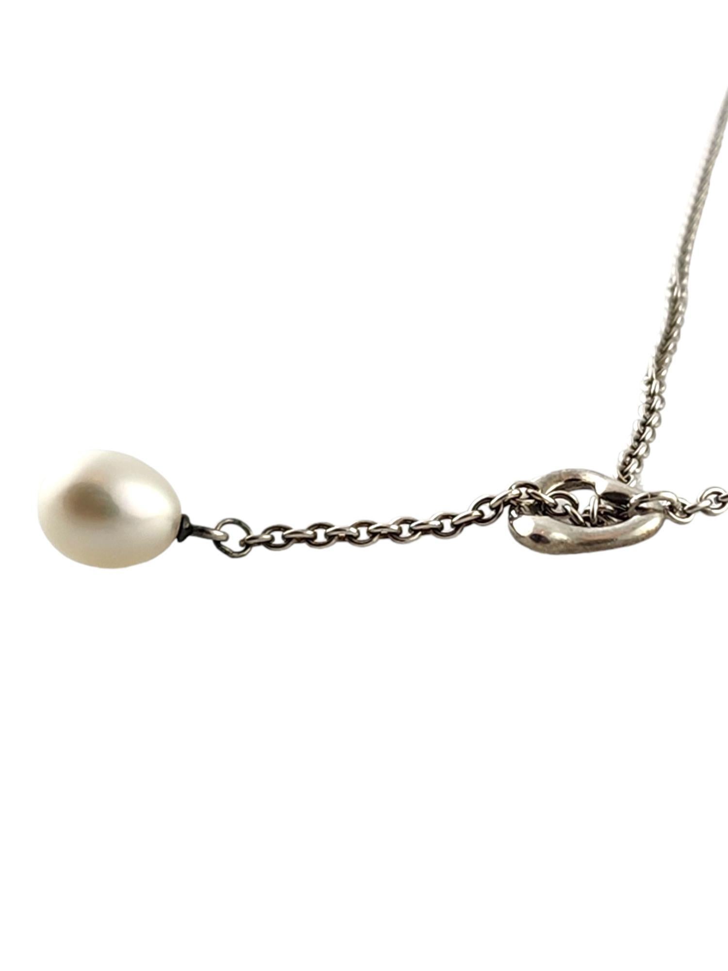 Tiffany & Co Sterling Silver Elsa Peretti Open Heart Lariat Pearl Necklace

This gorgeous sterling silver lariat style necklace has a beautiful pearl looped through an open heart by amazing designer Tiffany & Co!

Chain length: 19