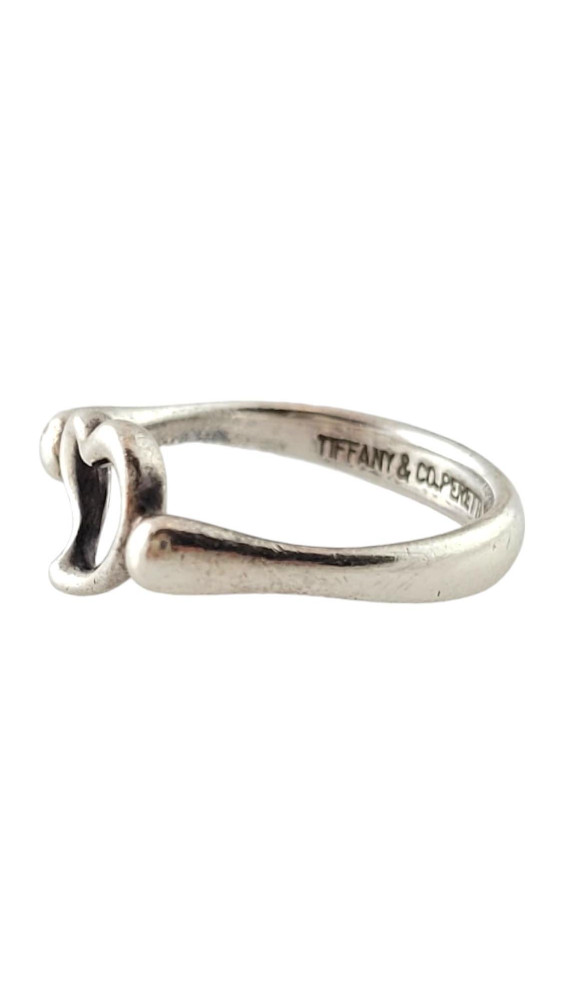 Tiffany & Co. Sterling Silver Elsa Peretti Open Heart Ring Size 5.75

This gorgeous open-heart ring by designer Tiffany & Co. was crafted form 925 sterling silver for a beautiful finish!

Ring size: 5.75
Shank: 3.43mm
Heart: 8.60mm

Weight: 1.59