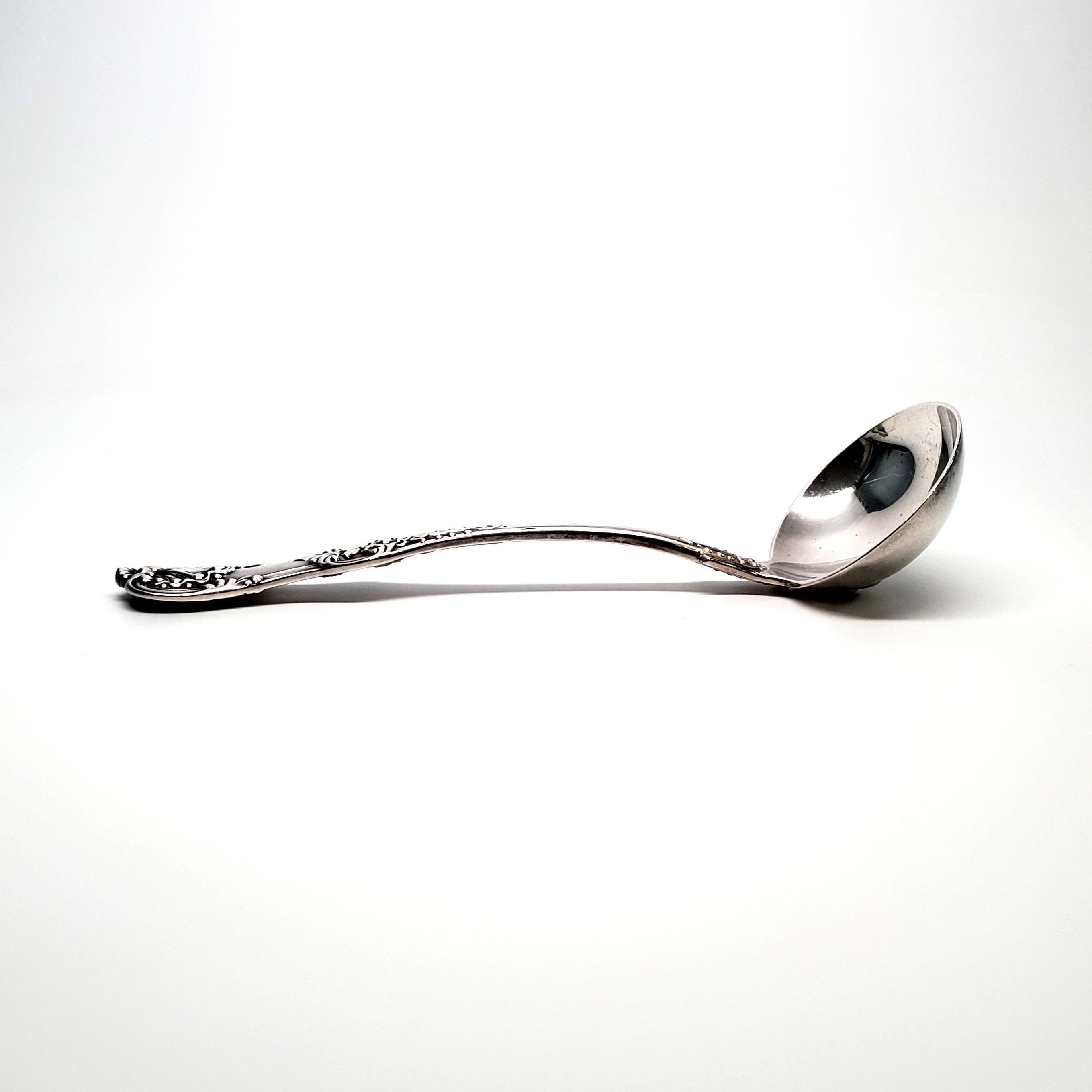 Sterling silver gravy ladle by Tiffany & Co in the English King pattern.

The English King pattern is heavy and ornate, featuring a scalloped tip and scrolled edge. Introduced in 1885, the pattern is still being produced today. No