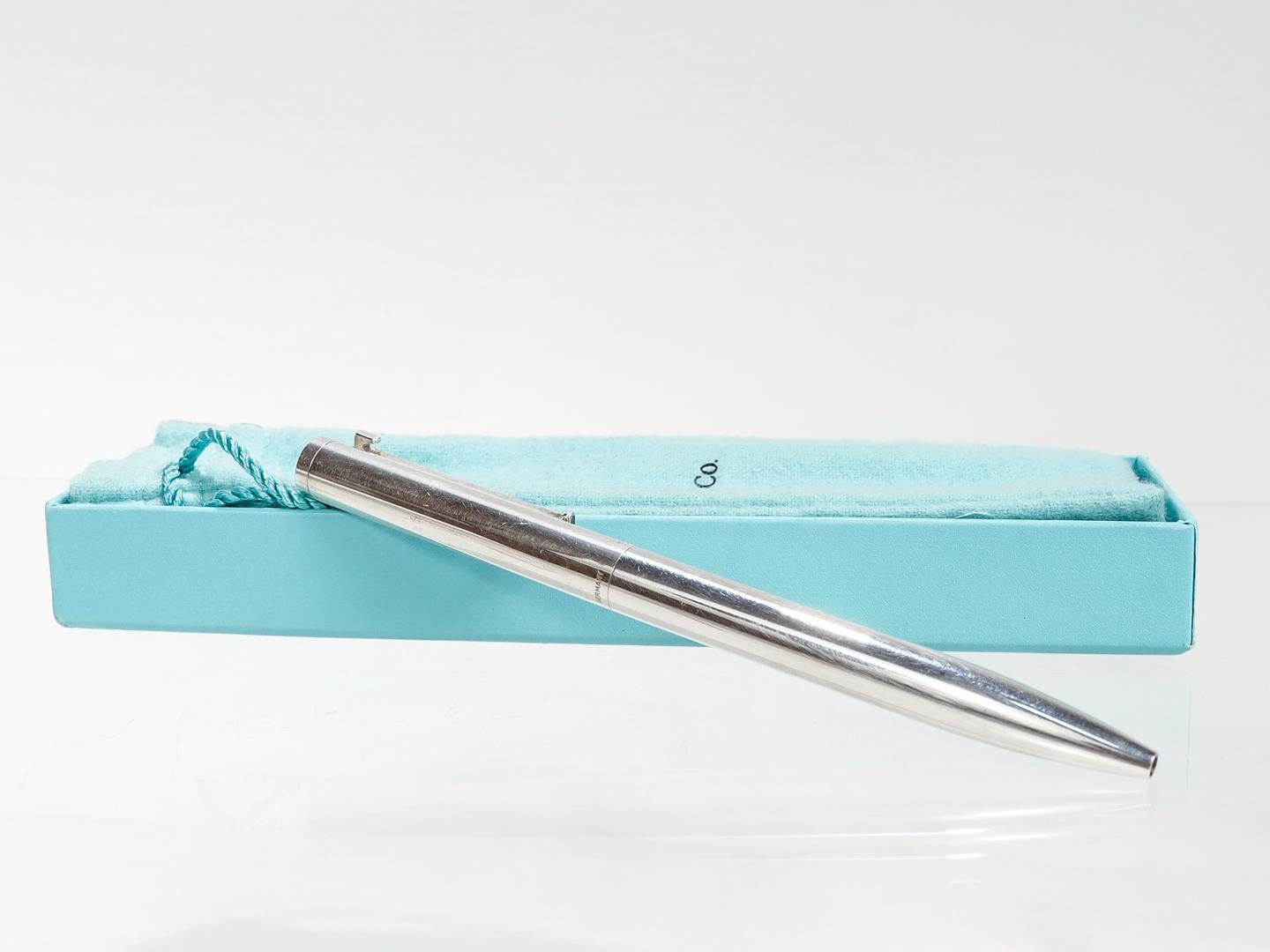 A fine T Clip Executive ballpoint pen.

By Tiffany & Co.

In sterling silver.

Together with its original box and pouch.

Simply a wonderful Tiffany item for everyday!

Date:
20th Century

Overall Condition:
It is in overall good, as-pictured, used