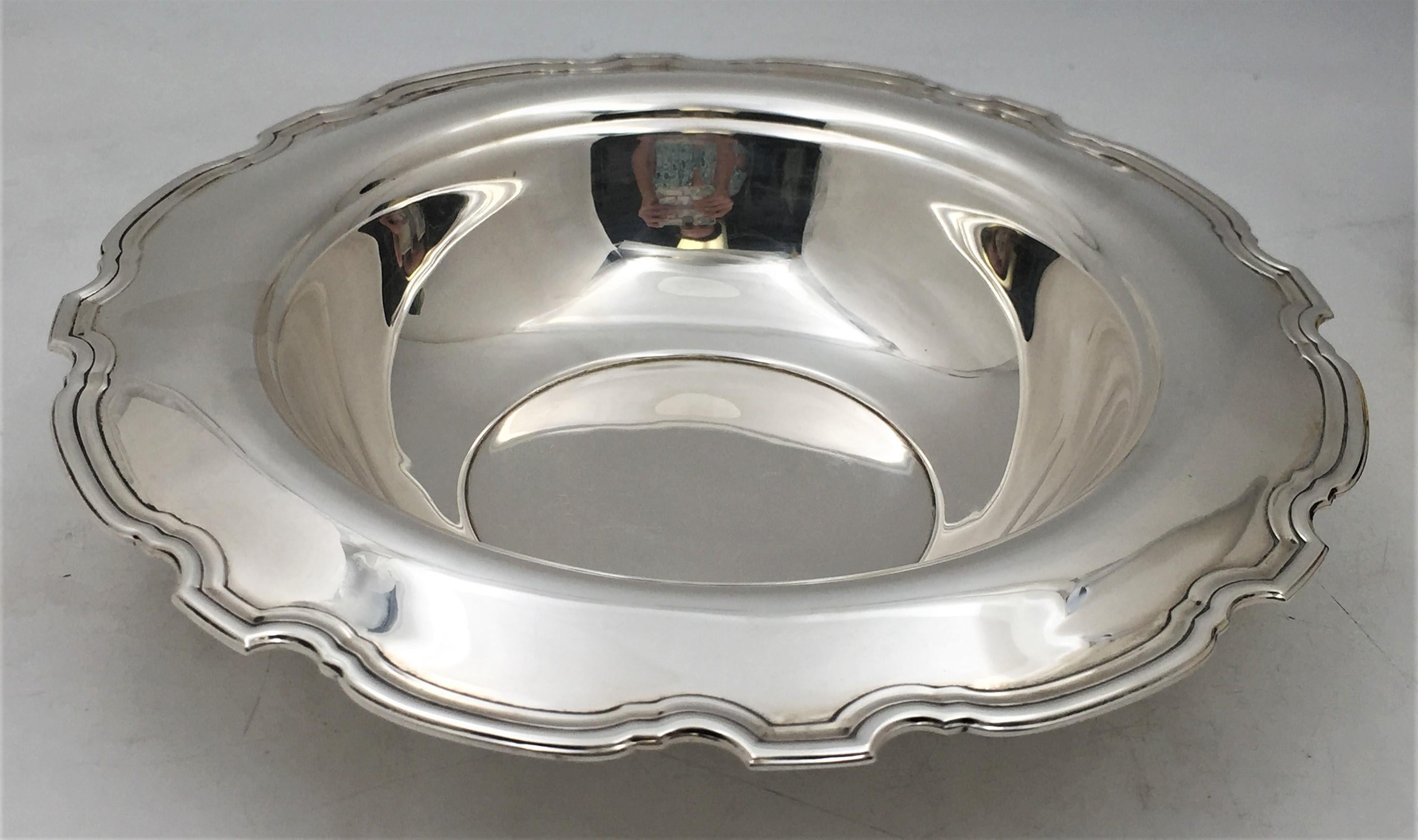 Large sterling silver centerpiece bowl in the Hampton pattern, made by Tiffany & Co. in 1925. The diameter is 12