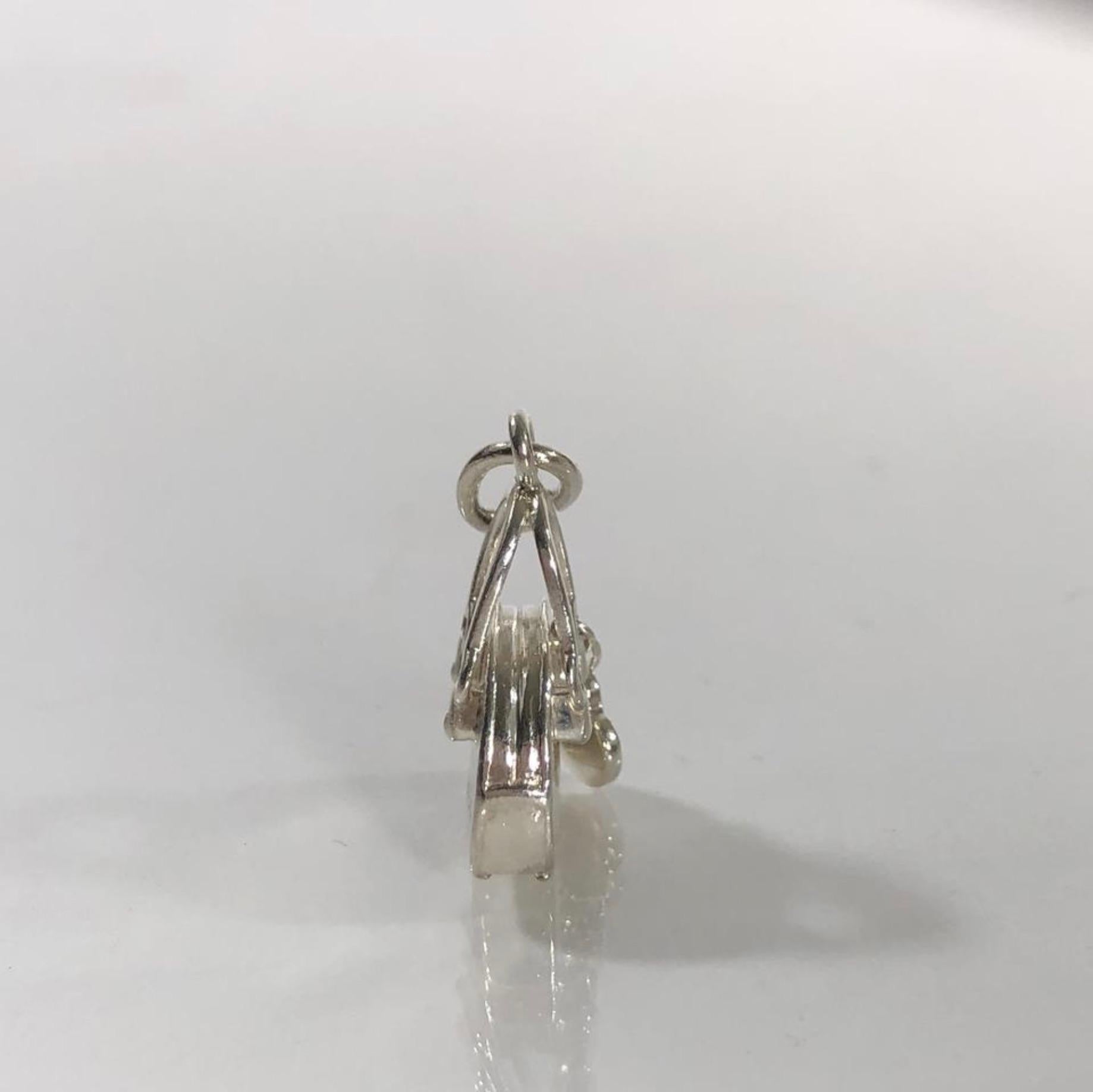 Tiffany & Co. Sterling Silver Handbag Charm or Pendent with Hanging Heart In Excellent Condition In Saint Charles, IL
