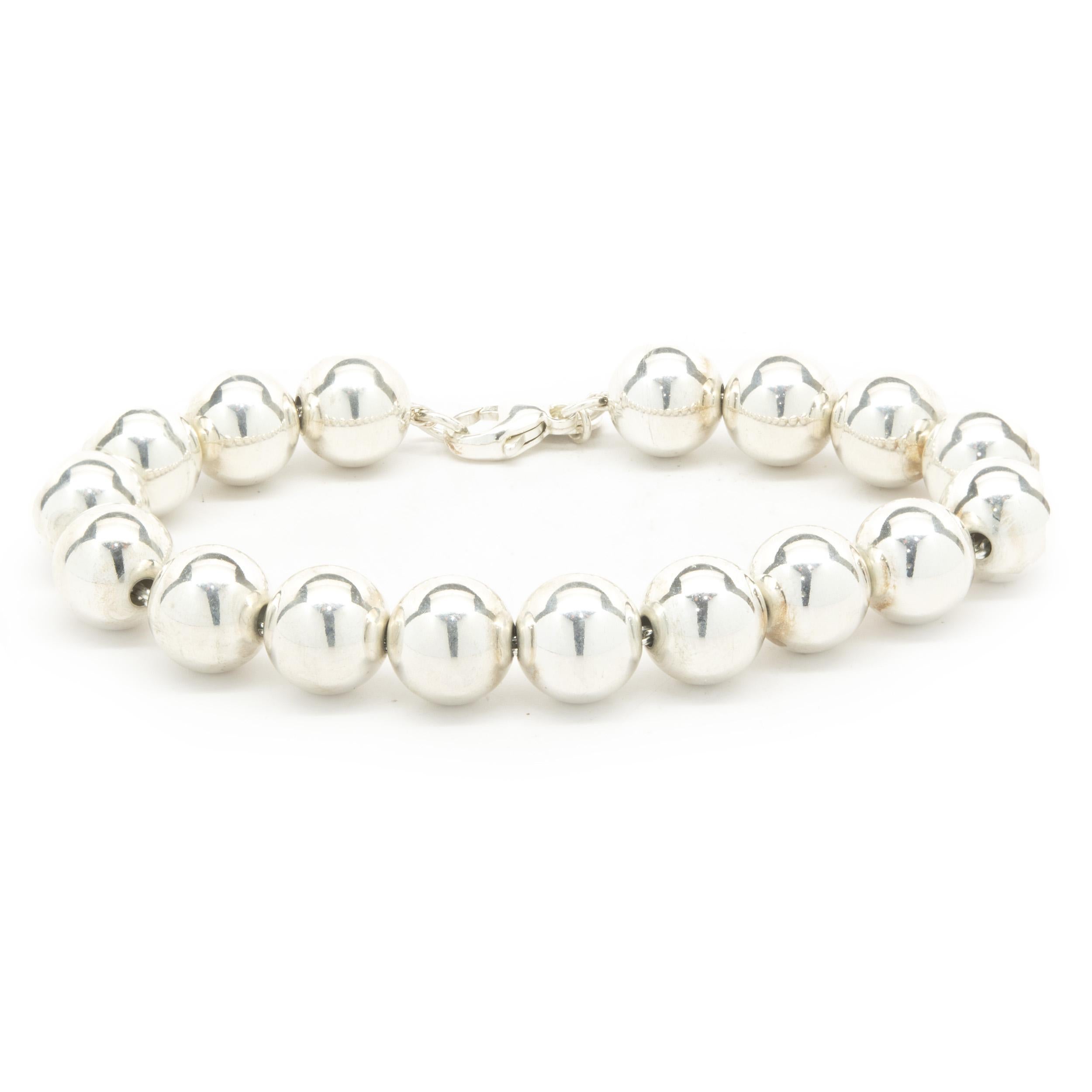Designer: Tiffany & Co.
Material: sterling silver
Dimensions: bracelet measures 7-inches
Weight: 17.60 grams