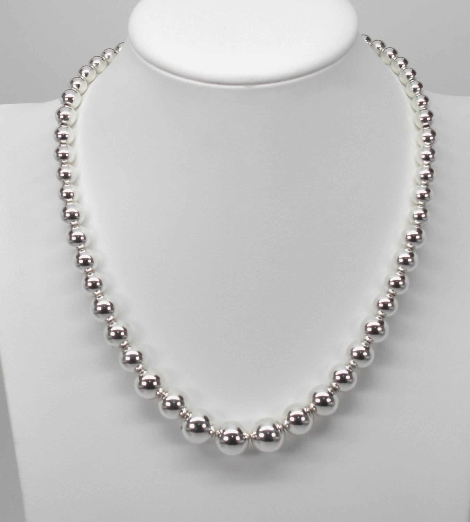 A timeless and versatile design, brilliant Tiffany & Co. HardWear Sterling Silver Ball Necklace and Earring Set. Brightly polished sterling silver graduated round beads ranging in size from 6mm to 11mm are strung on sterling link chain to create