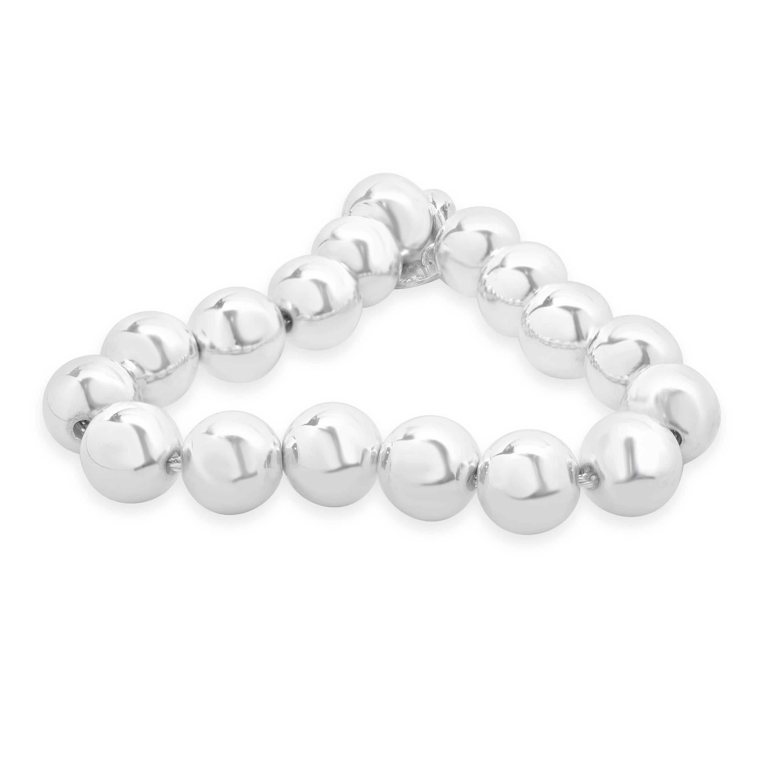 Designer: Tiffany & Co. 
Material: sterling silver
Dimensions: bracelet measures 7.25-inches in length
Weight: 20.00 grams
