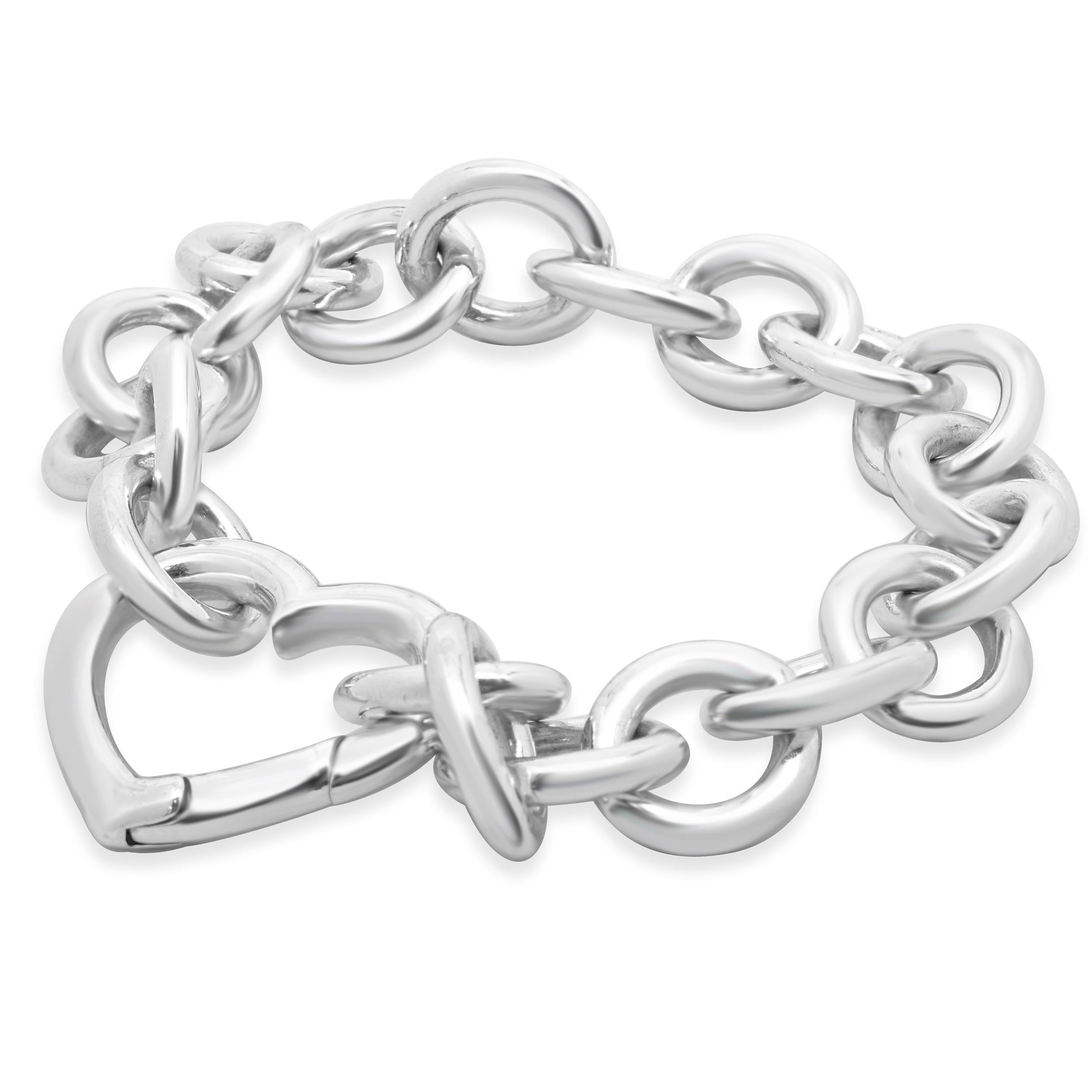 Designer: Tiffany & co. 
Material: sterling silver
Dimensions: bracelet will fit approximately a 6.5-inch wrist 
Weight: 47.5 grams
