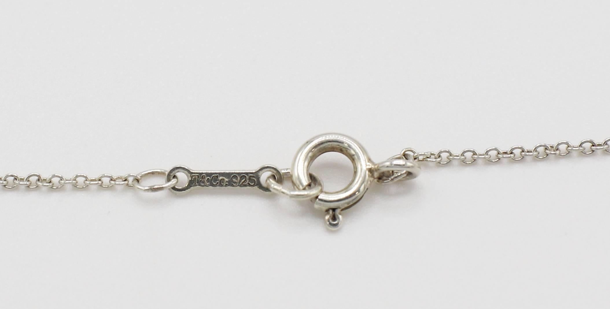 Tiffany & Co. Sterlingsilber Herzblumen-Halskette mit natürlichem Diamant-Anhänger Damen