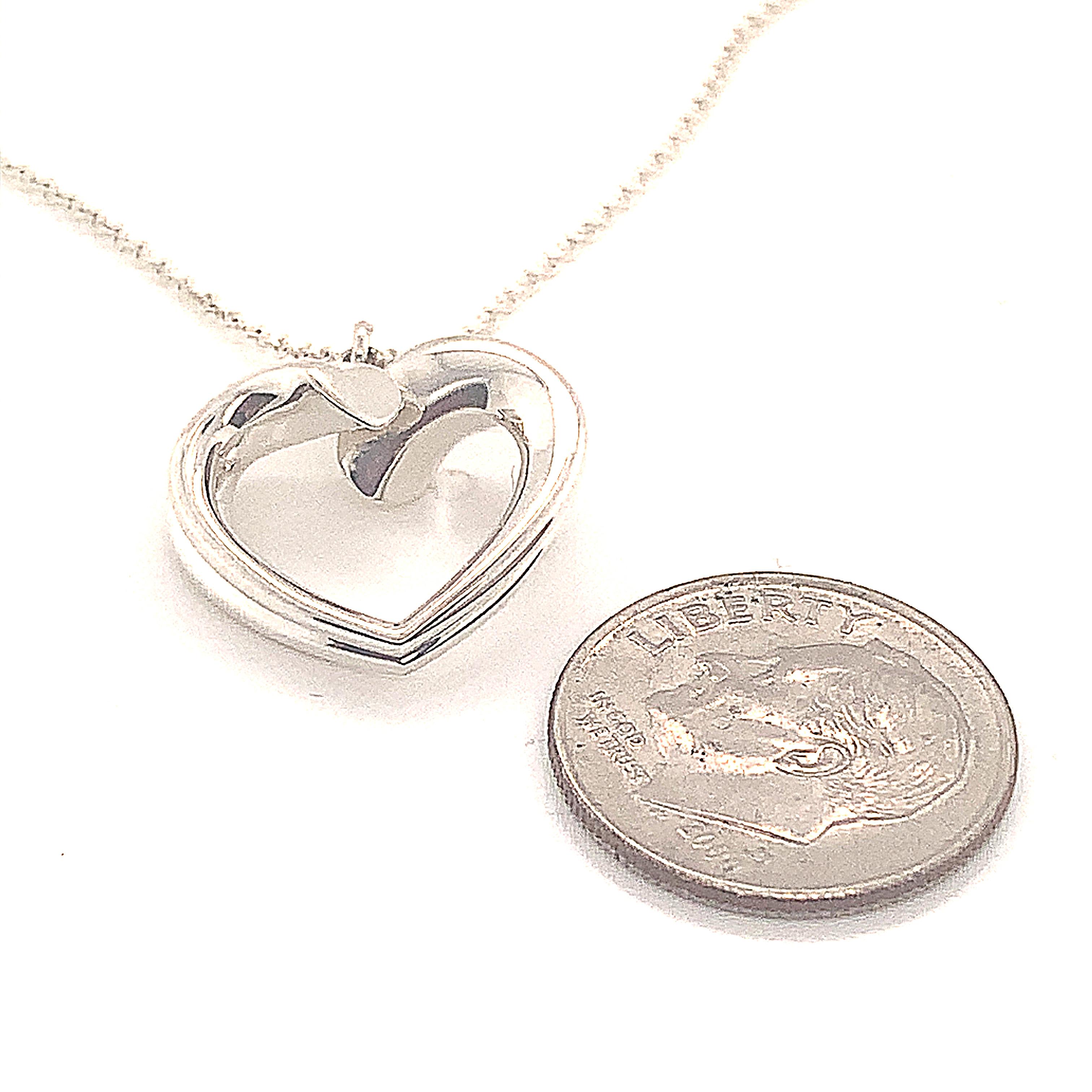 Tiffany & Co Sterling Silver Heart Necklace 16 Inches 4.4 Grams TIF110
 
This elegant Authentic Tiffany & Co necklace is made of sterling silver and has a weight of 4.4 grams.

TRUSTED SELLER SINCE 2002
 
PLEASE SEE OUR HUNDREDS OF POSITIVE