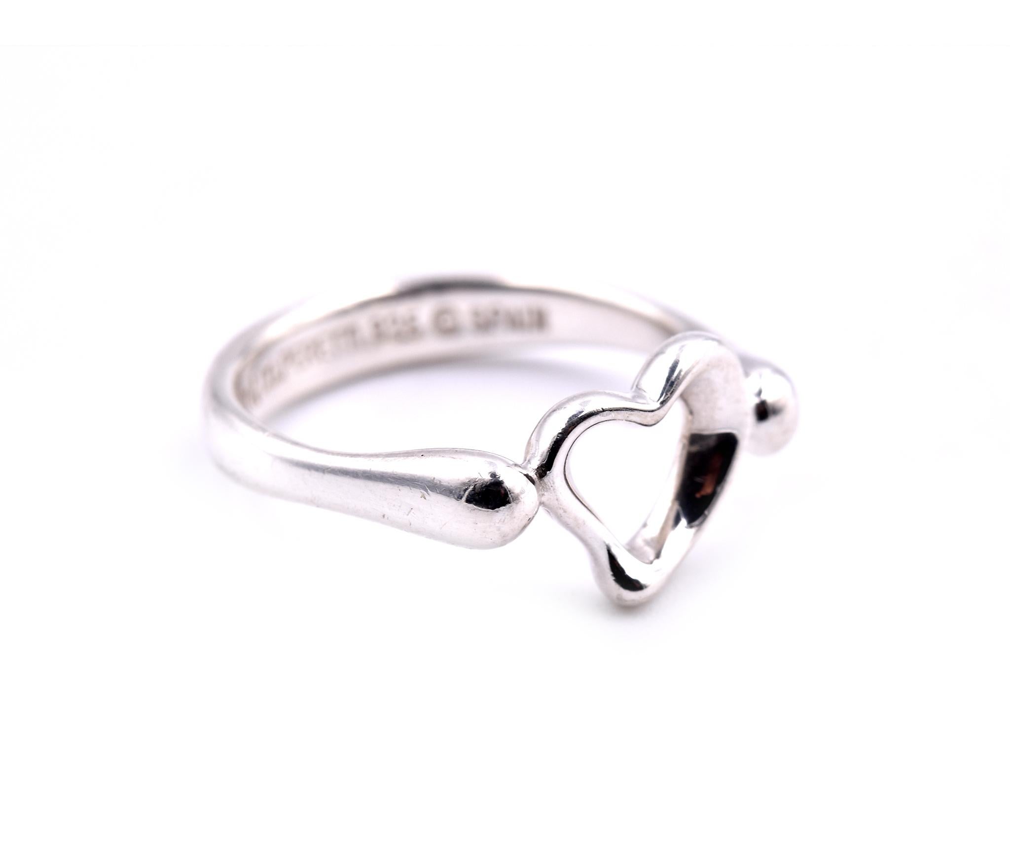 Designer: Tiffany & Co
Material: sterling silver
Dimensions: ring top is 18.31mm wide
Ring Size: 5 ¼ (please allow two additional shipping days for sizing requests)
Weight: 2.50 grams