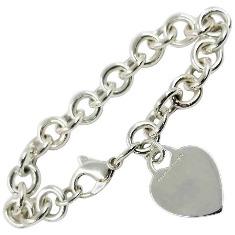 Tiffany and Co. Sterling Silver Heart Tag Charm Bracelet at 1stDibs |  tiffany and co silver heart bracelet, tiffany tag chain bracelet, tiffany  bracelet heart