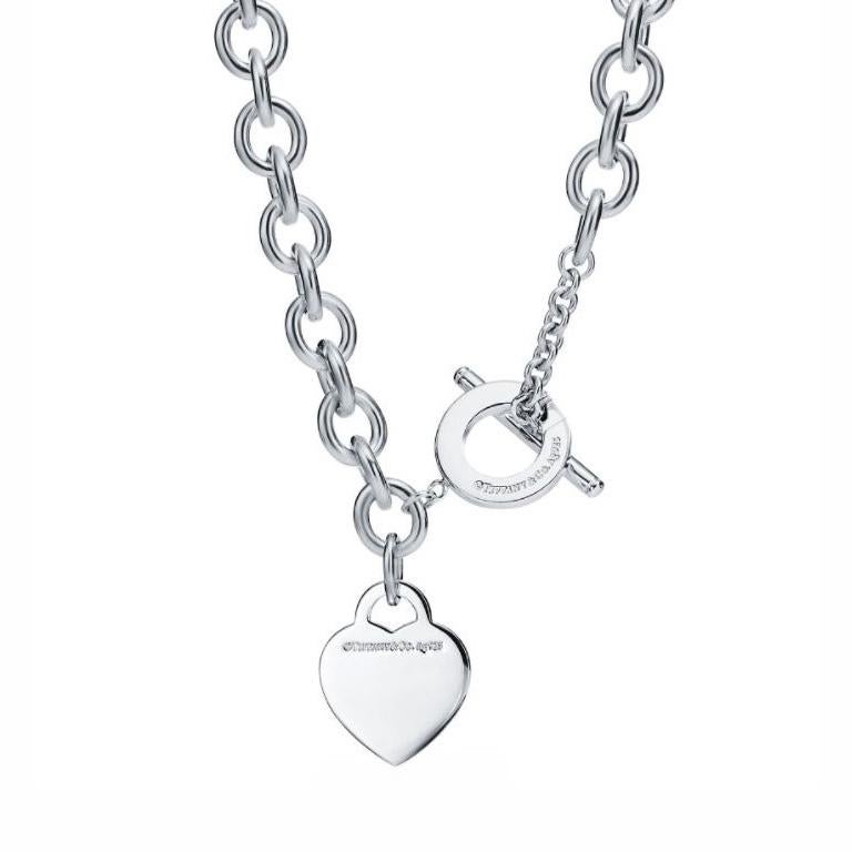 Tiffany & Co. Sterling Silver Heart Toggle Choker Necklace. The links measure 9mm wide and the choker necklace is 15