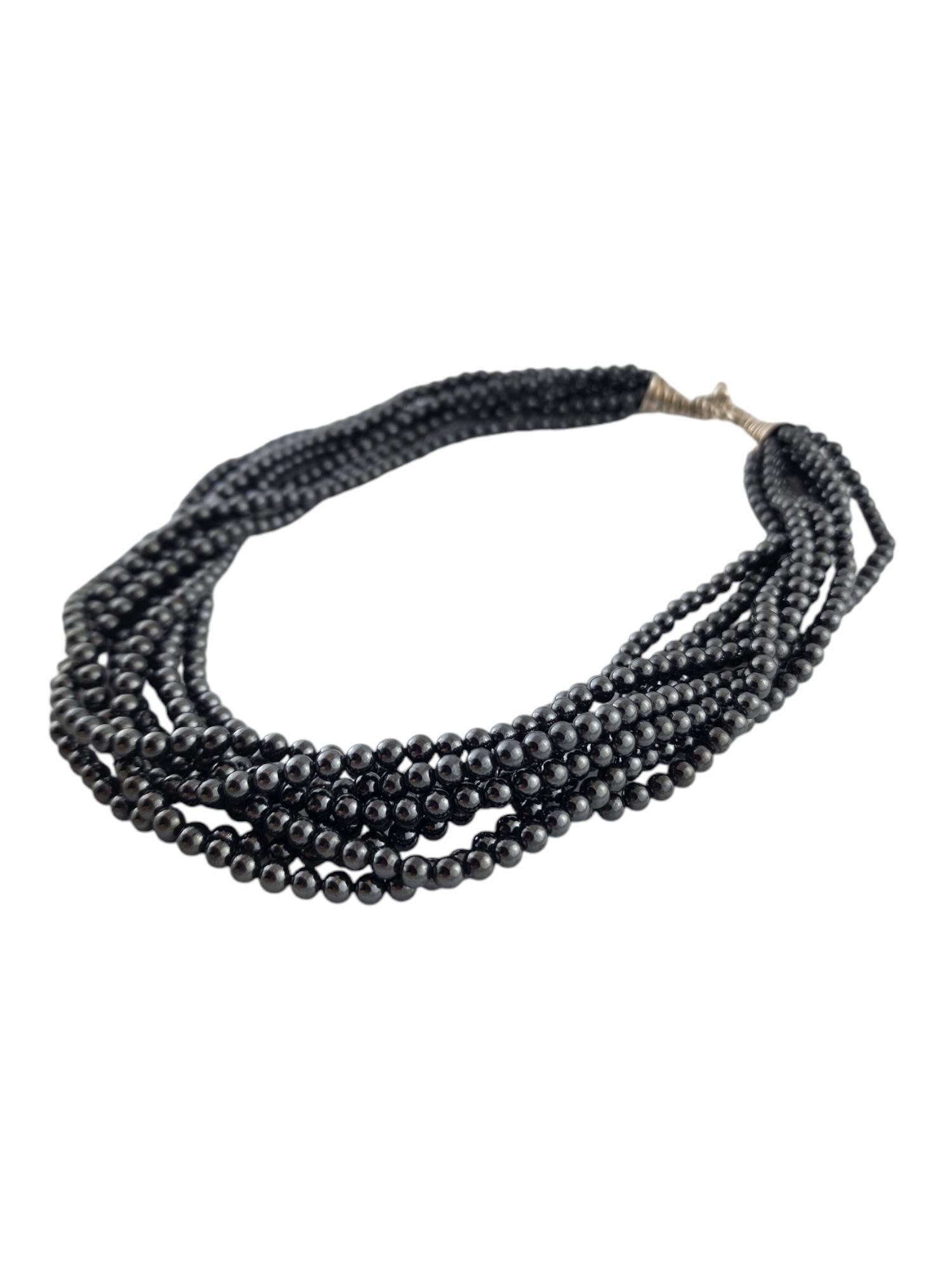Tiffany & Co Sterling Silver Hematite Bead Torsade Necklace

This stunning sterling silver necklace by Tiffany & Co. features 8 strands of hematite beads for a gorgeous look that will look amazing on you!

Length: 17 1/4