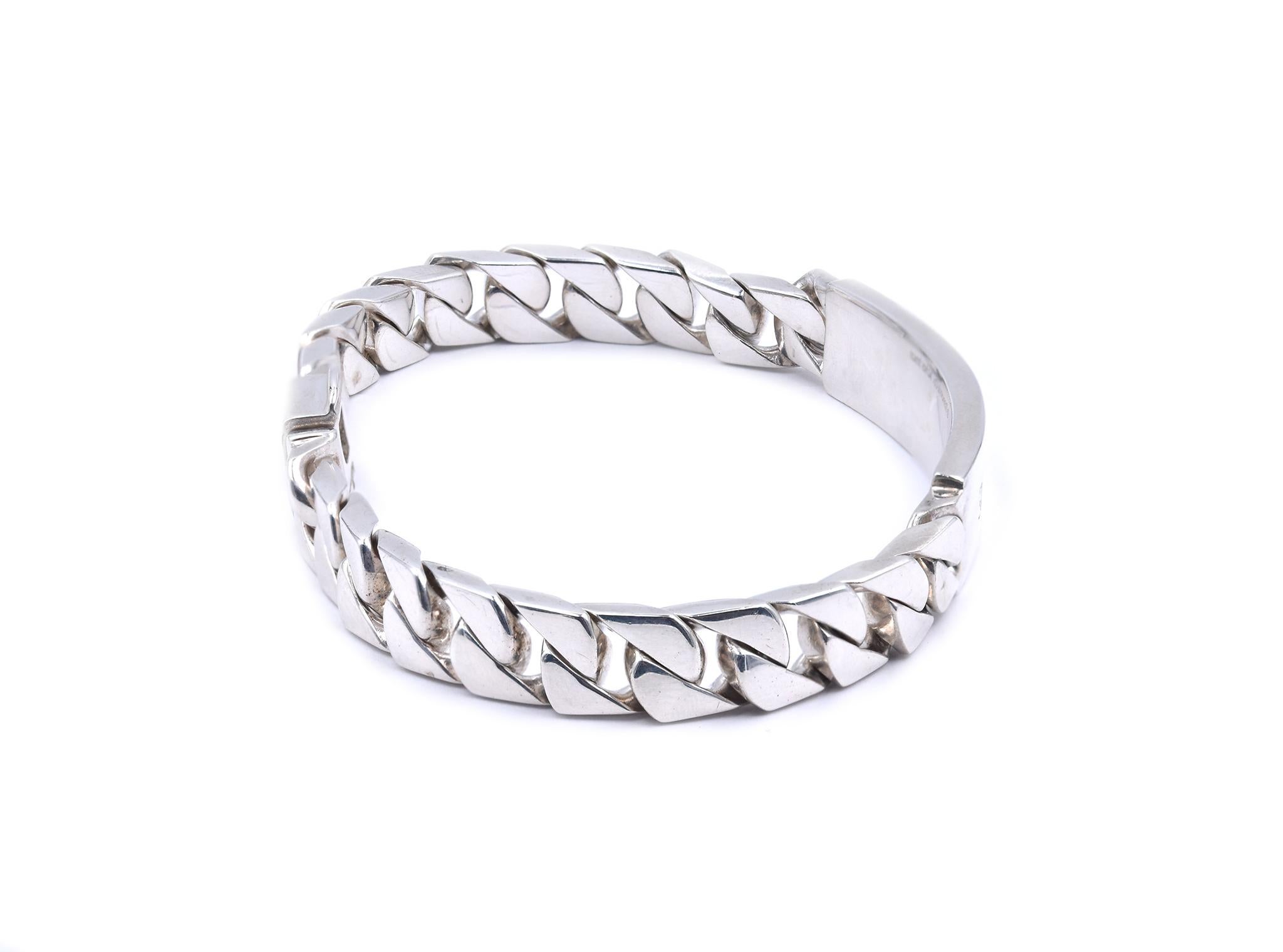 Designer: Tiffany & Co. 
Material: sterling silver
Dimensions: bracelet measures 8-inches long, 11mm wide
Weight: 53.01 grams

