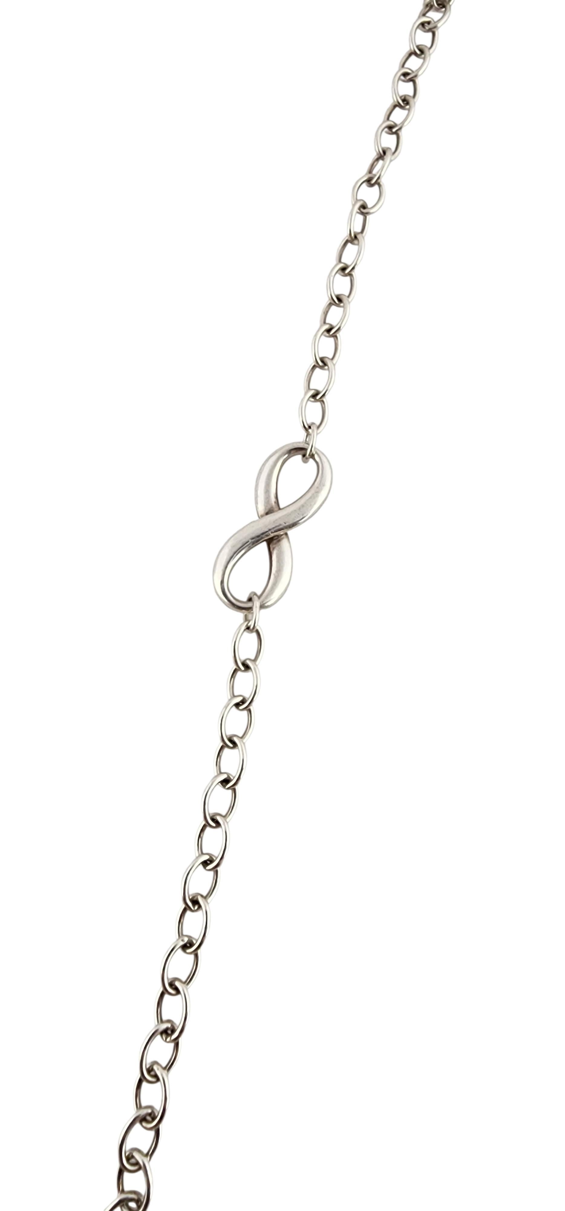 Tiffany & Co Plata de Ley Pulsera de eslabones con el signo del infinito #23993 en Bueno estado para la venta en Washington Depot, CT