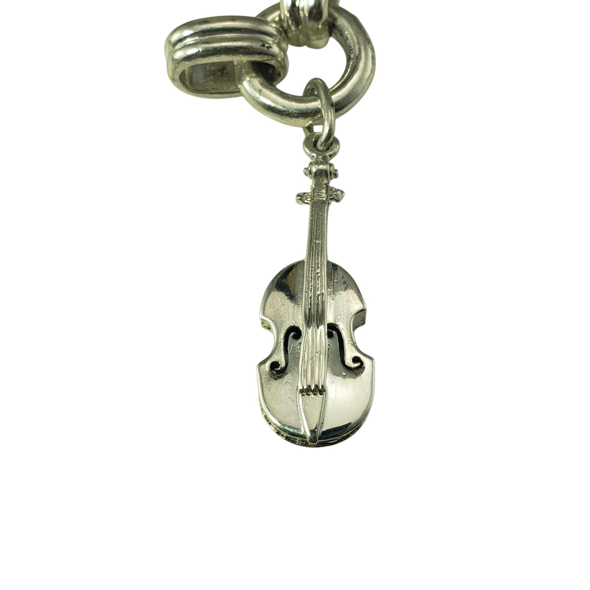 Contemporary Tiffany & Co. Sterling Silver Jazz Instrument Charm Bracelet #21387 For Sale