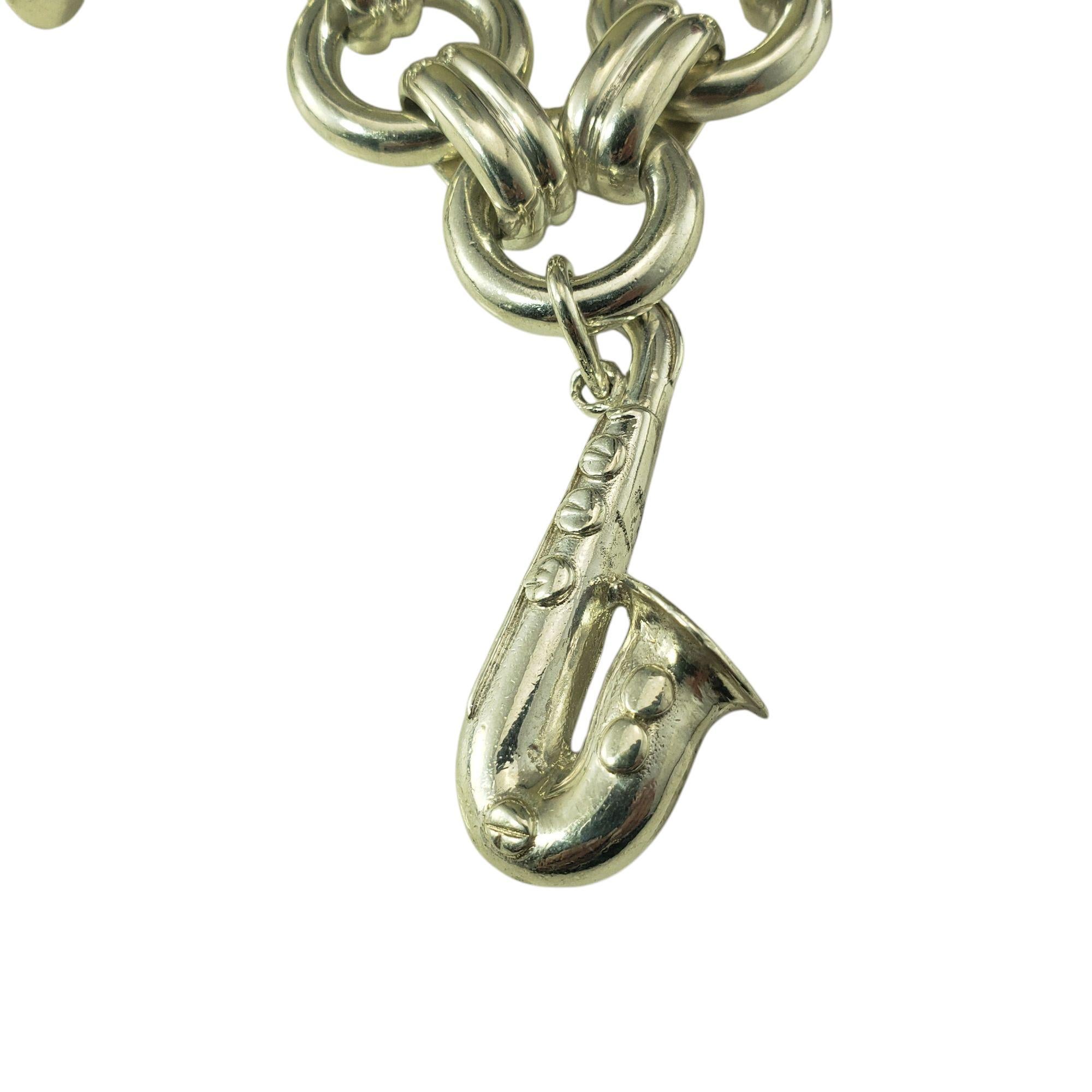 Tiffany & Co. Sterling Silver Jazz Instrument Charm Bracelet #21387 In Good Condition For Sale In Washington Depot, CT