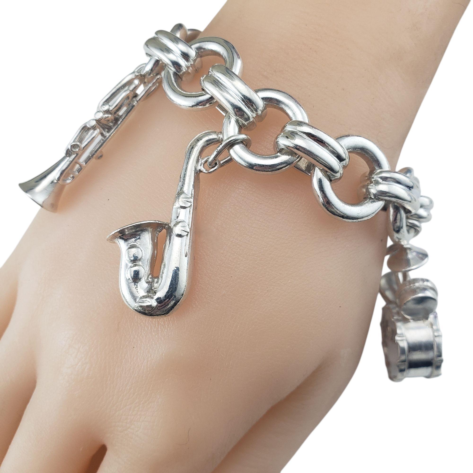 Tiffany & Co. Sterling Silver Jazz Instrument Charm Bracelet #21387 For Sale 4